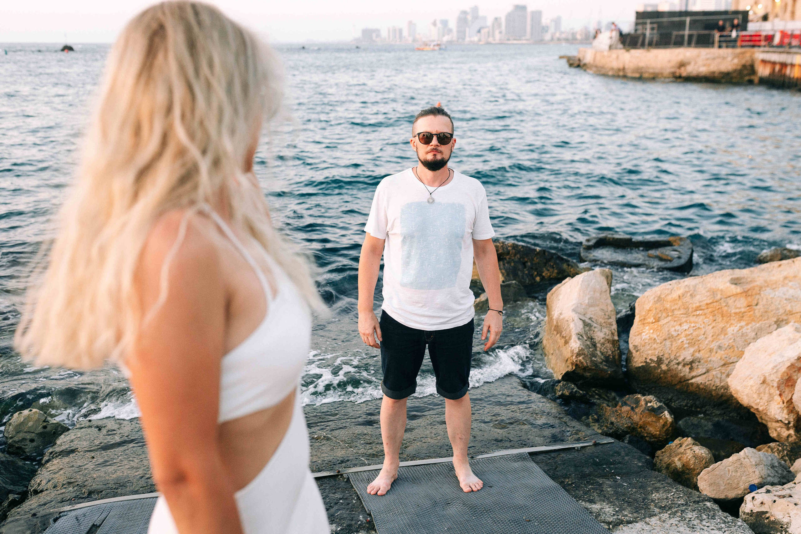 SUNSET IN JAFFO PORT. PHOTOGRAPHER IN ISRAEL