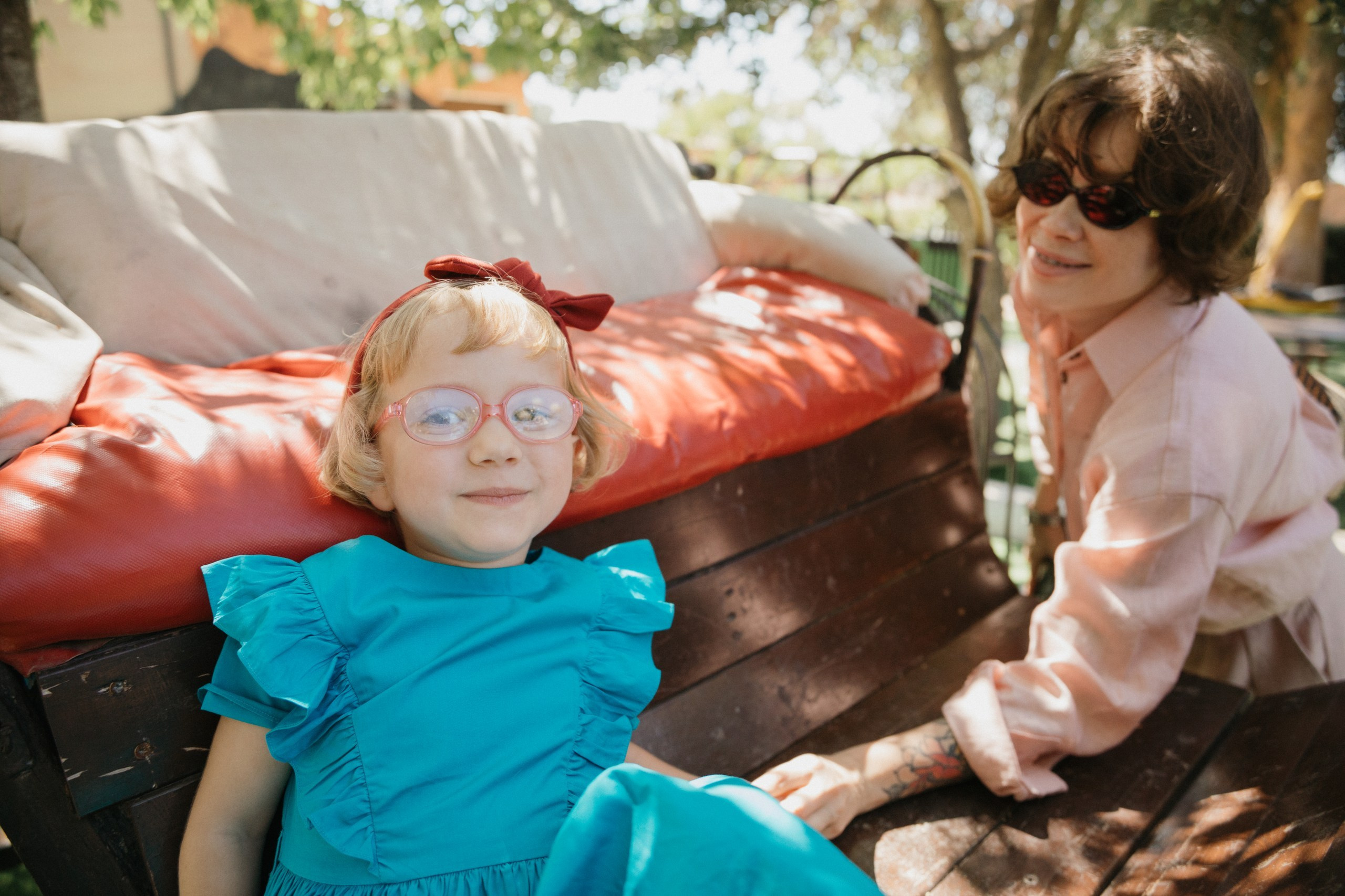 Joyful Moments in Camel park: Olya and Ada’s Day of Fun and Adventure, sliding and riding camels. Photographer in Barcelona capturing unique stories | Kate Chumak