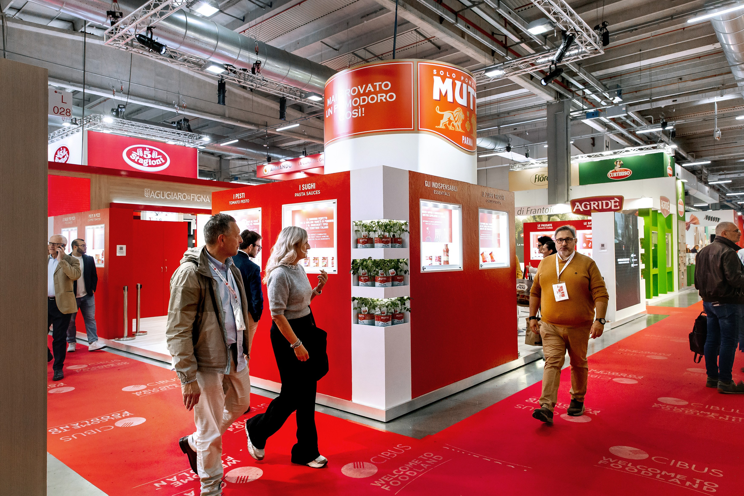 Stand dell'azienda Mutti alla fiera Cibus 2024 a Parma, Area interattiva dell'azienda Mutti alla fiera Cibus 2024