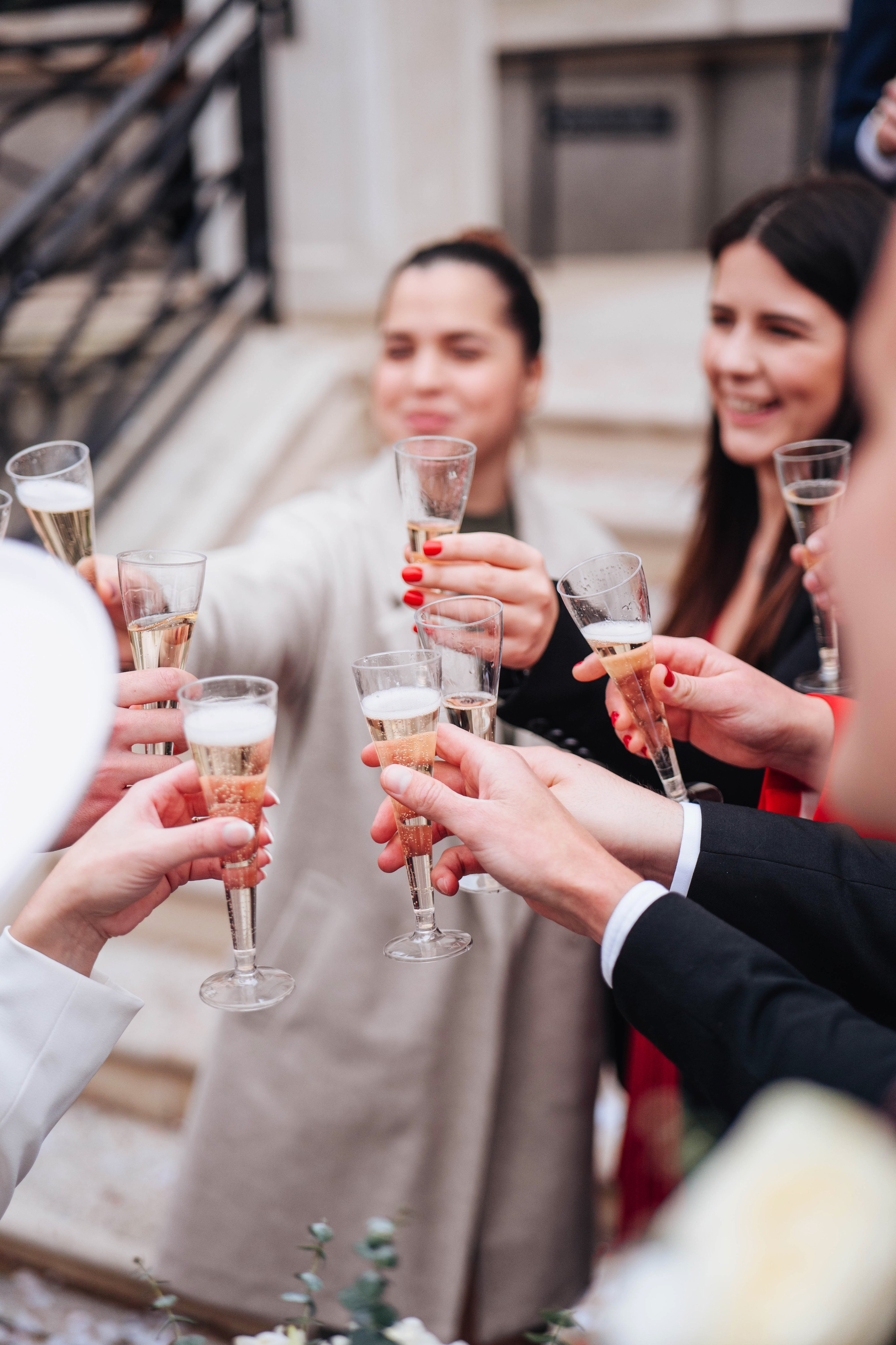 Exit from Islington town hall, champagne bottle opening 