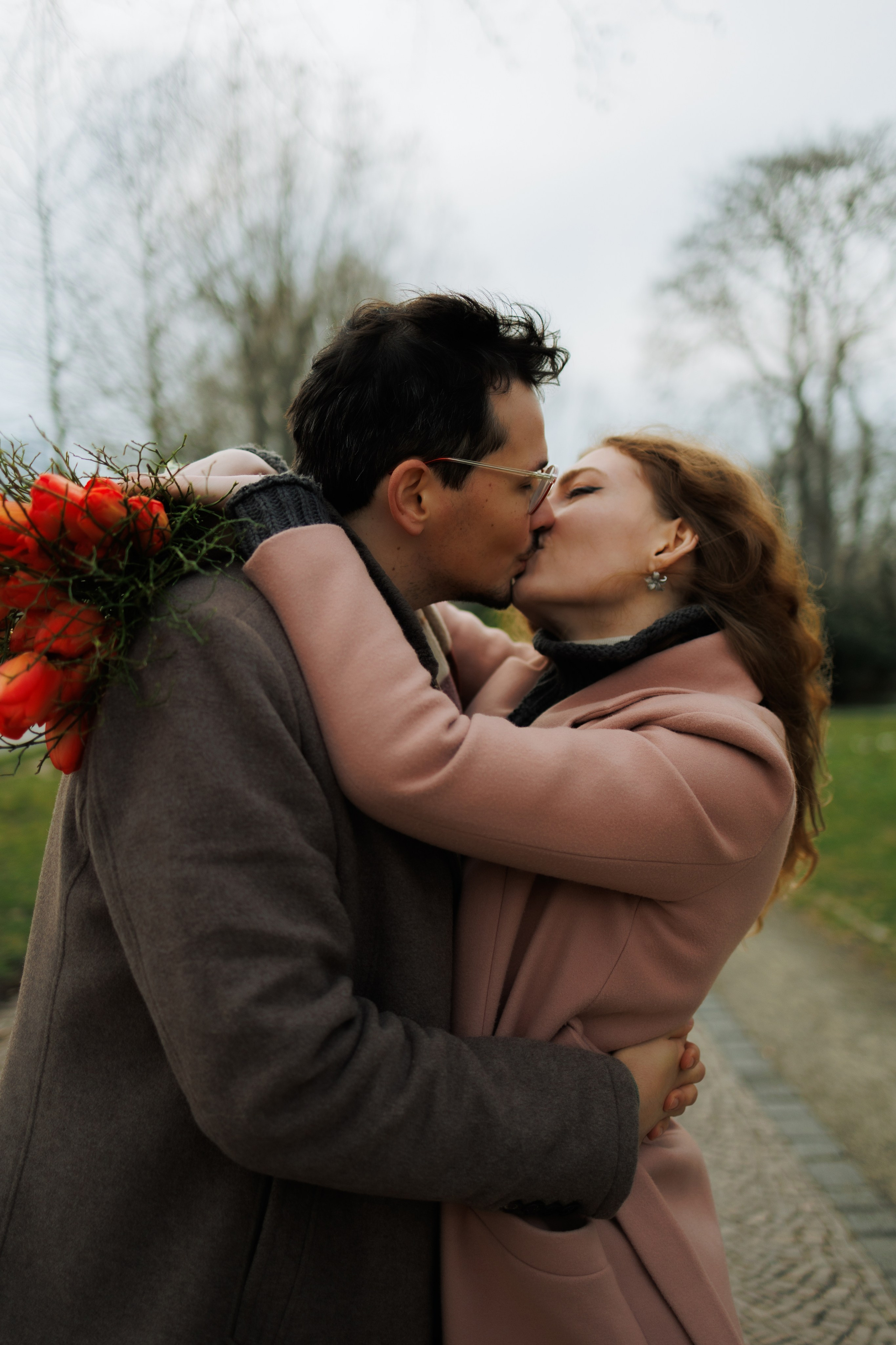 Love Story in Leipzig Park. Emotional&Cinematic Couple Photoshoot by Kristina Kozheltsova. Kristina Kozheltsova- Soulful Portrait&Lifestyle&Love Story Photographer in Leipzig, Germany
