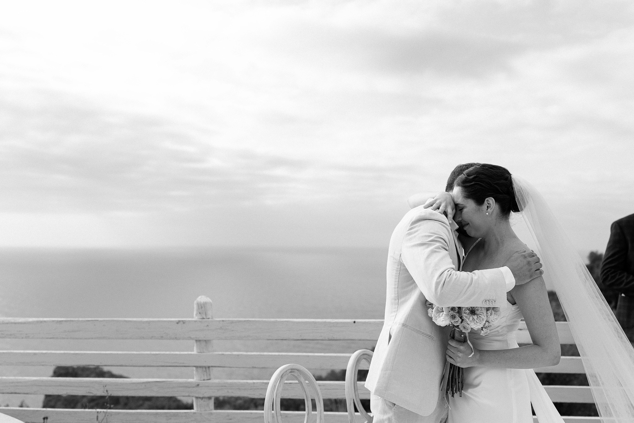 Bride and groom sharing an emotional embrace Mallorca wedding