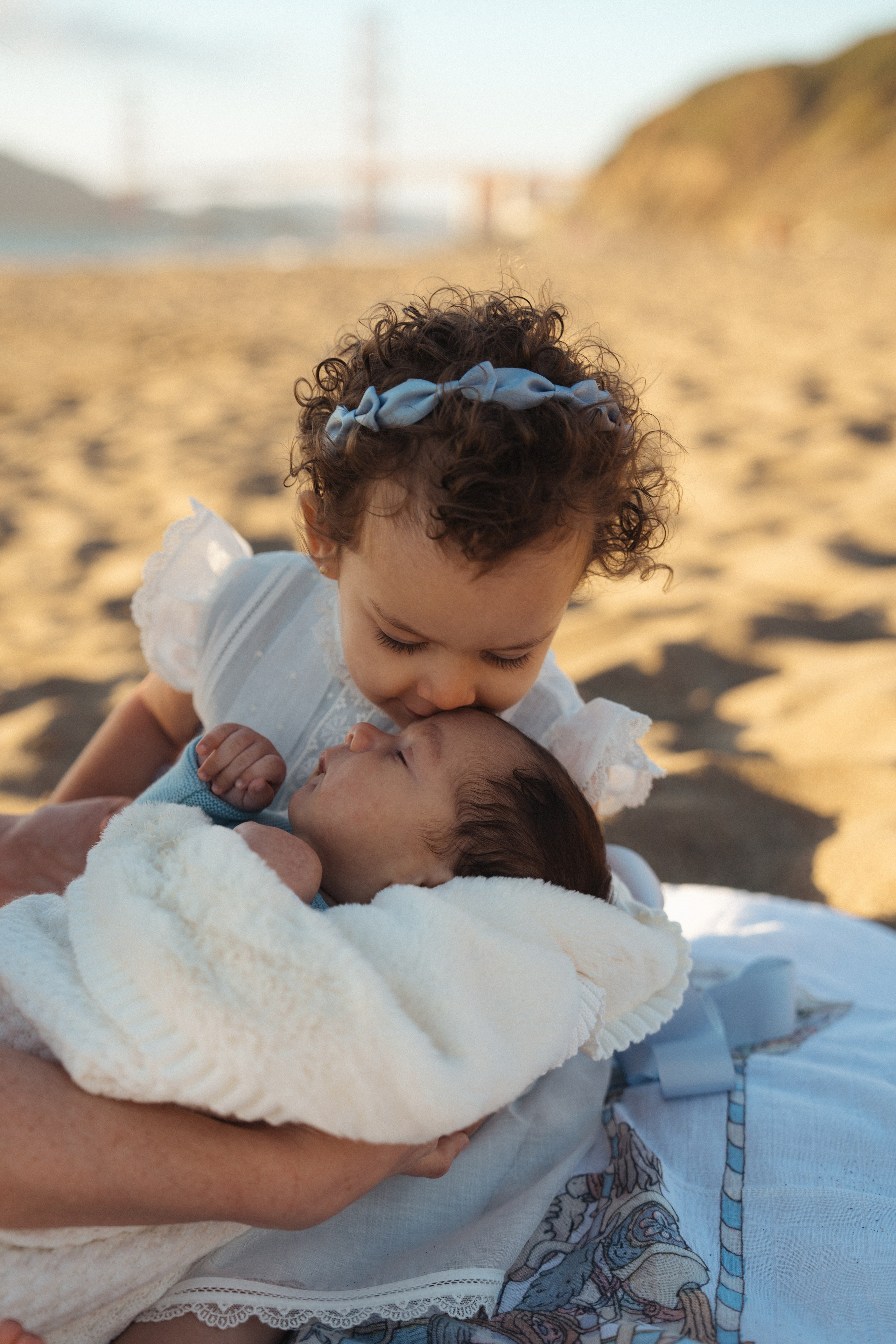 Bri’s growing family at Baker Beach. Soulo Photography | San Francisco Bay Area Based Photographer