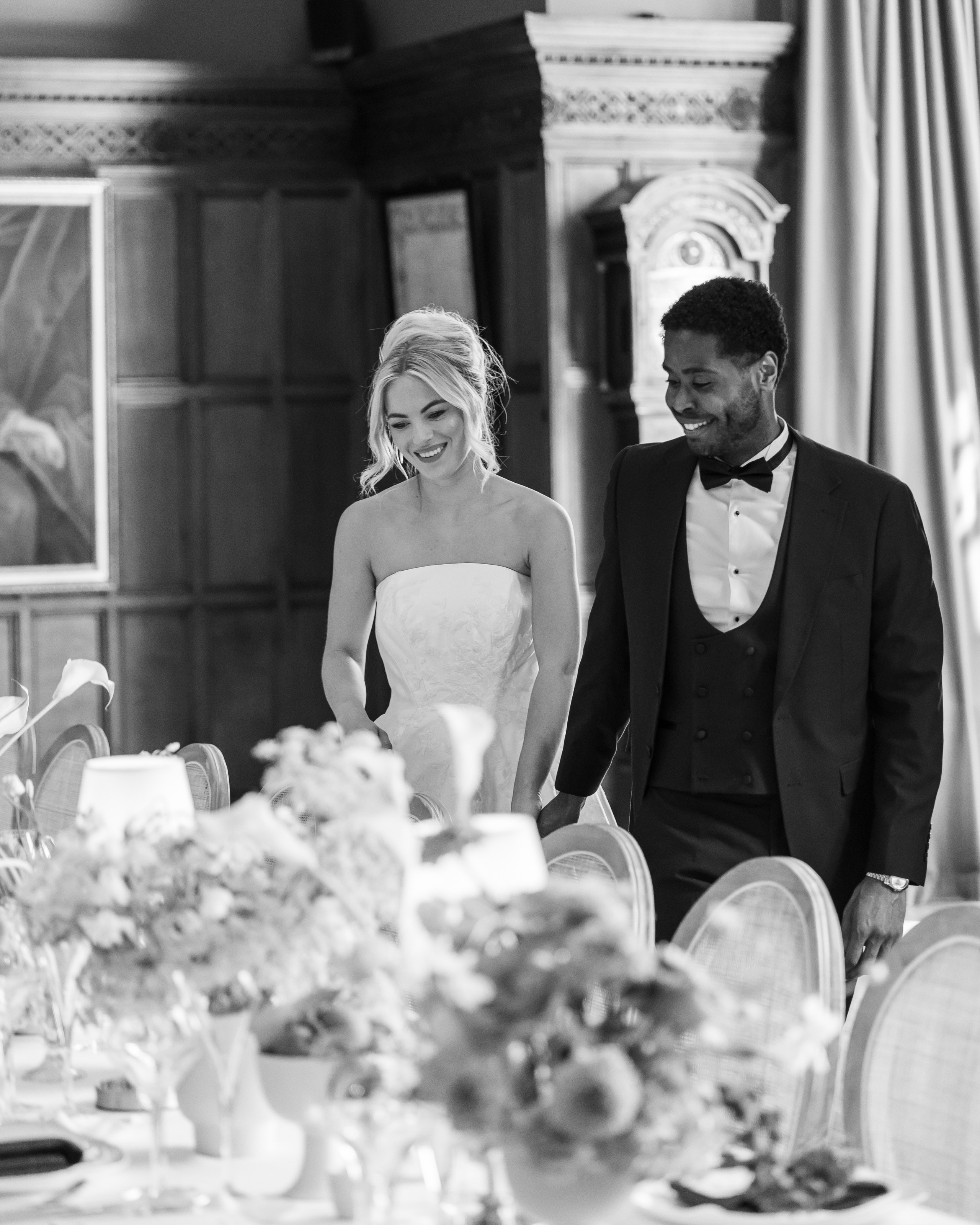 Elegant wedding portrait of bride and groom walking through the streets of ParisRomantic elopement moment captured in soft evening light in Paris, FranceLuxury wedding ceremony setup in a historic French venue with natural floralsCandid black and white photo of a couple at their city wedding in London, UKTimeless couple portrait in front of Marylebone Town Hall, LondonEditorial-style bridal preparation in a classic townhouse in the heart of LondonSoft light bridal portrait in a countryside château wedding in FranceFine art flat lay with French-inspired wedding details and vintage texturesCinematic golden hour photo at a UK estate wedding with historic architectureLuxury wedding tablescape with candles and florals at a London reception