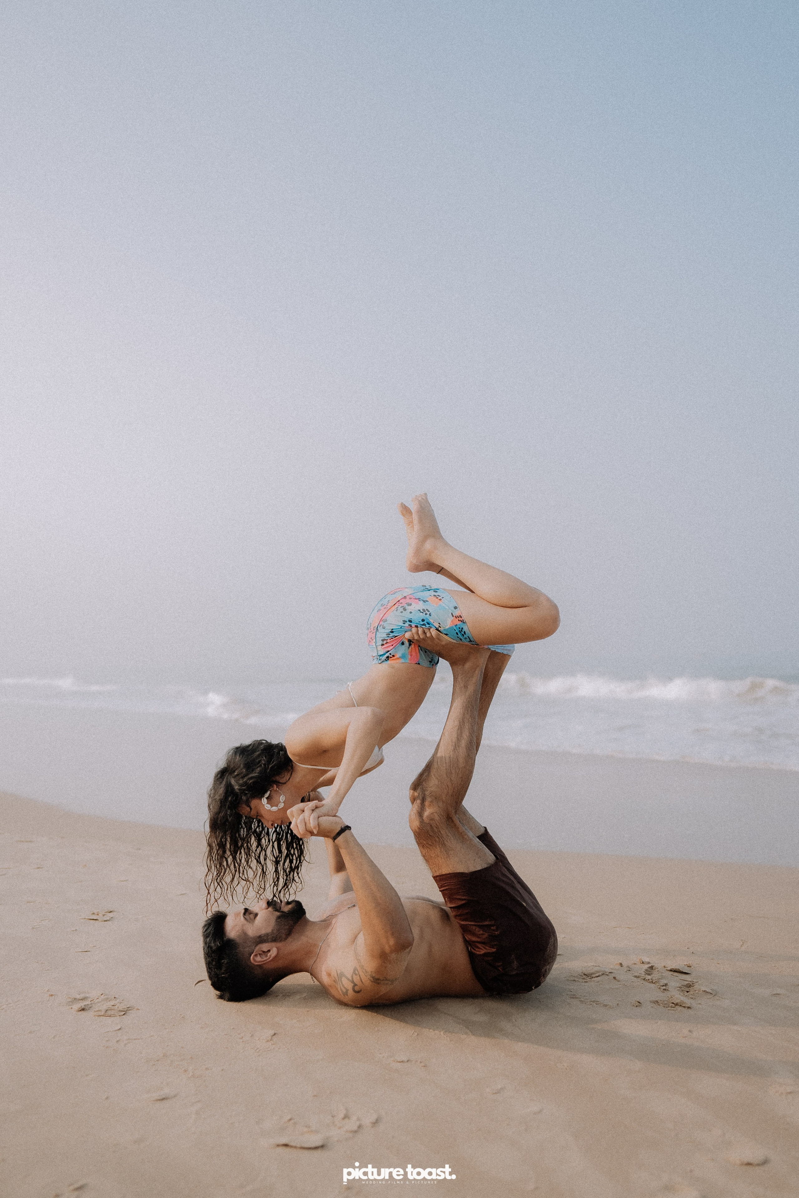 Love In The Beach. Fine art Wedding Photographers in India & Canada