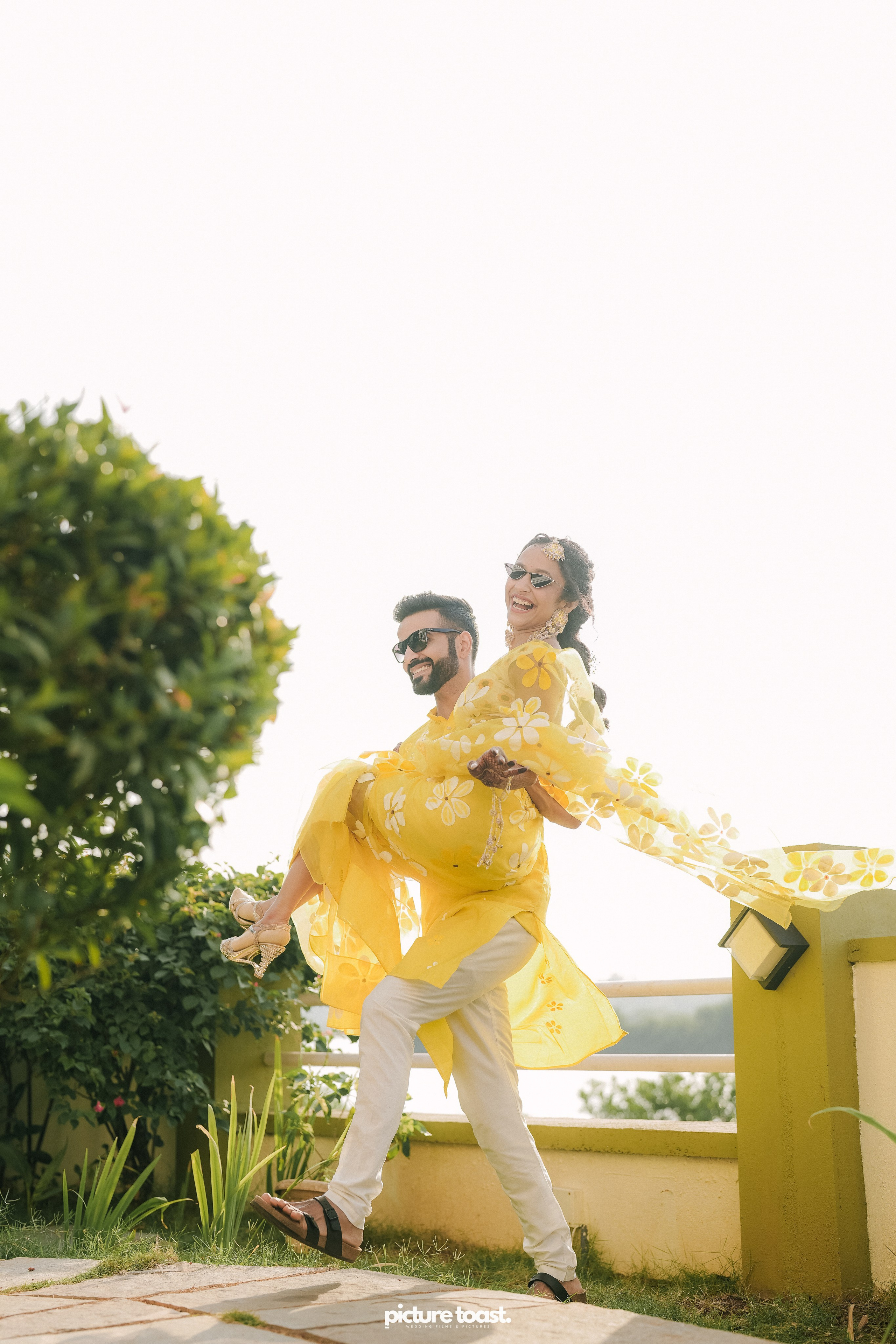 Haldi Hues Ft. Baebie & Goyal. Fine art Wedding Photographers in India & Canada
