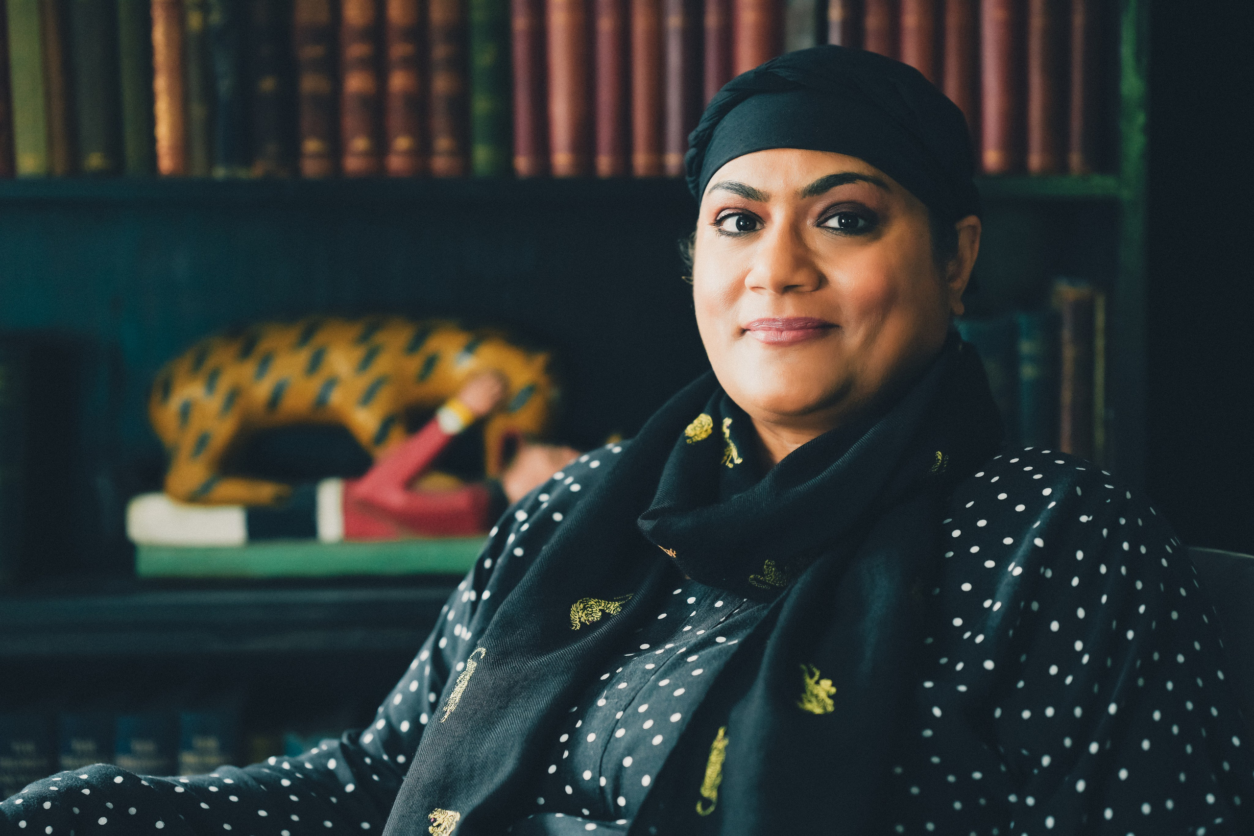 Lifestyle brand portrait of a woman in a calm, atmospheric interior