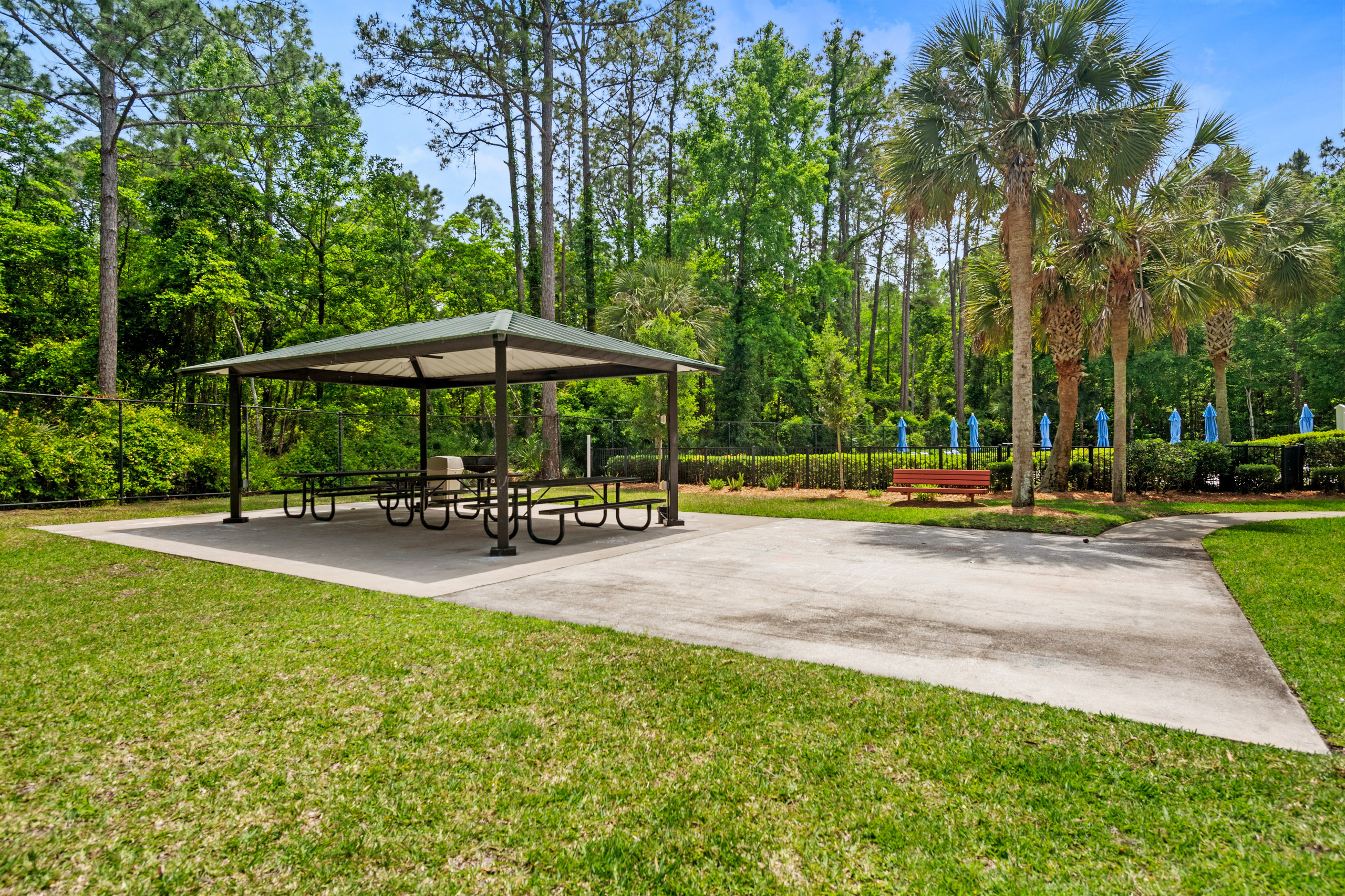Outdoor shaded seating area in a community park setting