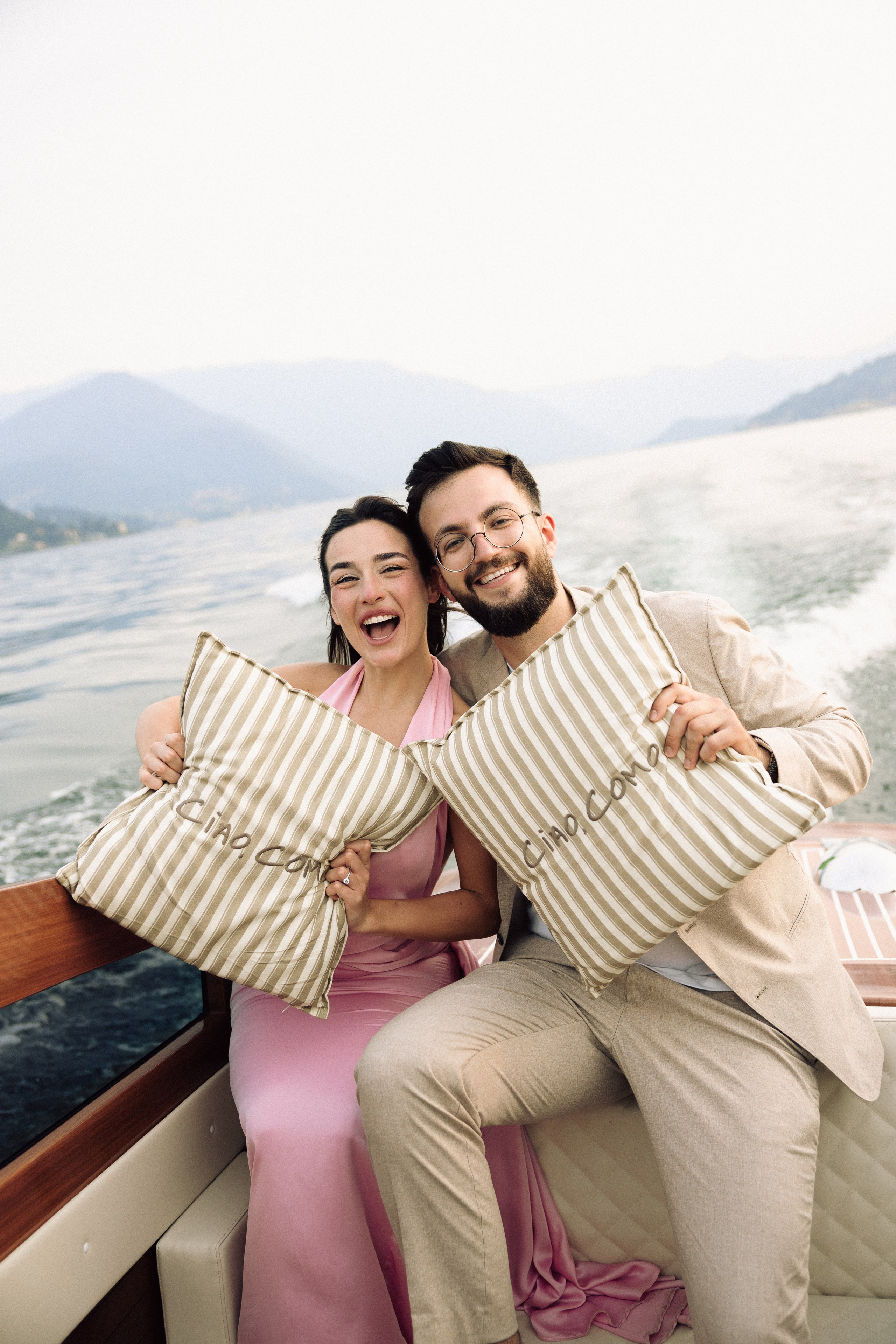 Couple laughing together during their romantic Lake Como engagement