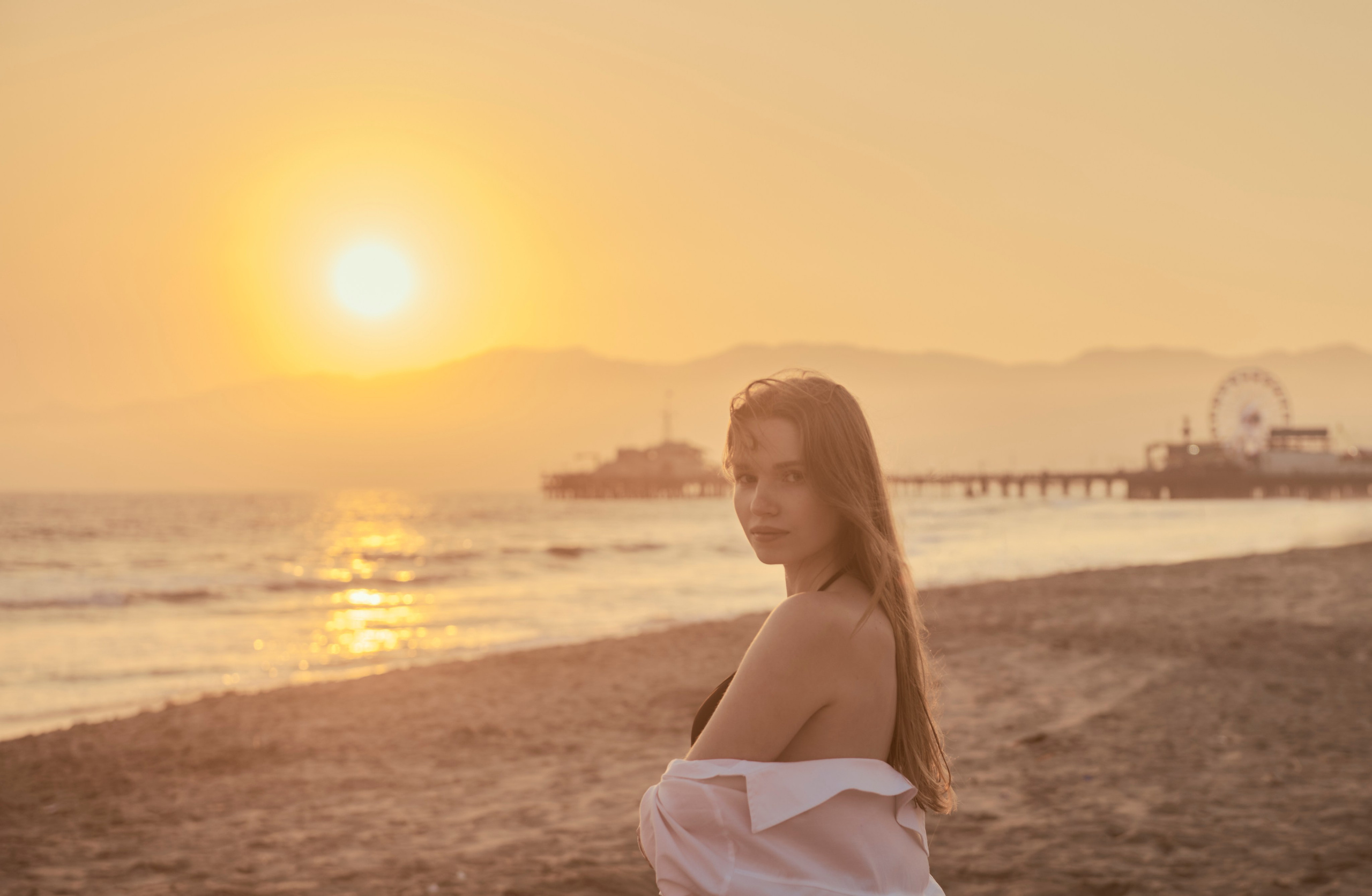 Santa Monica Beach: atmospheric photo featuring a model by the shore