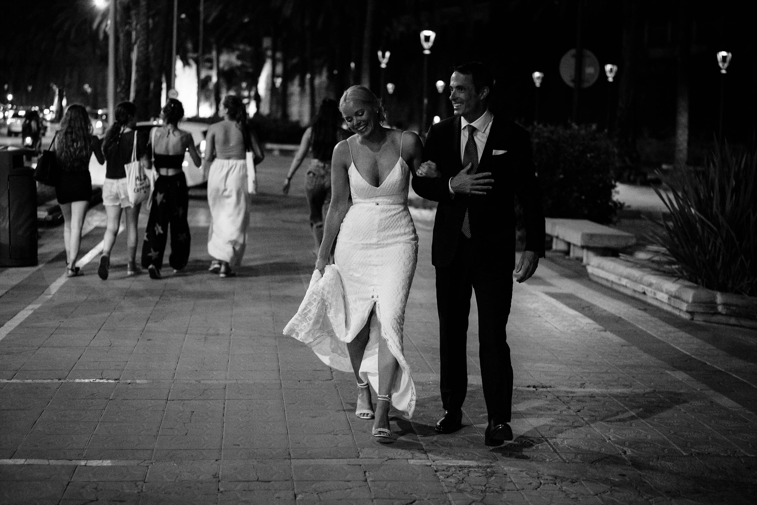 Walking down the street dressed as Bride and Groom, with people smiling as you pass