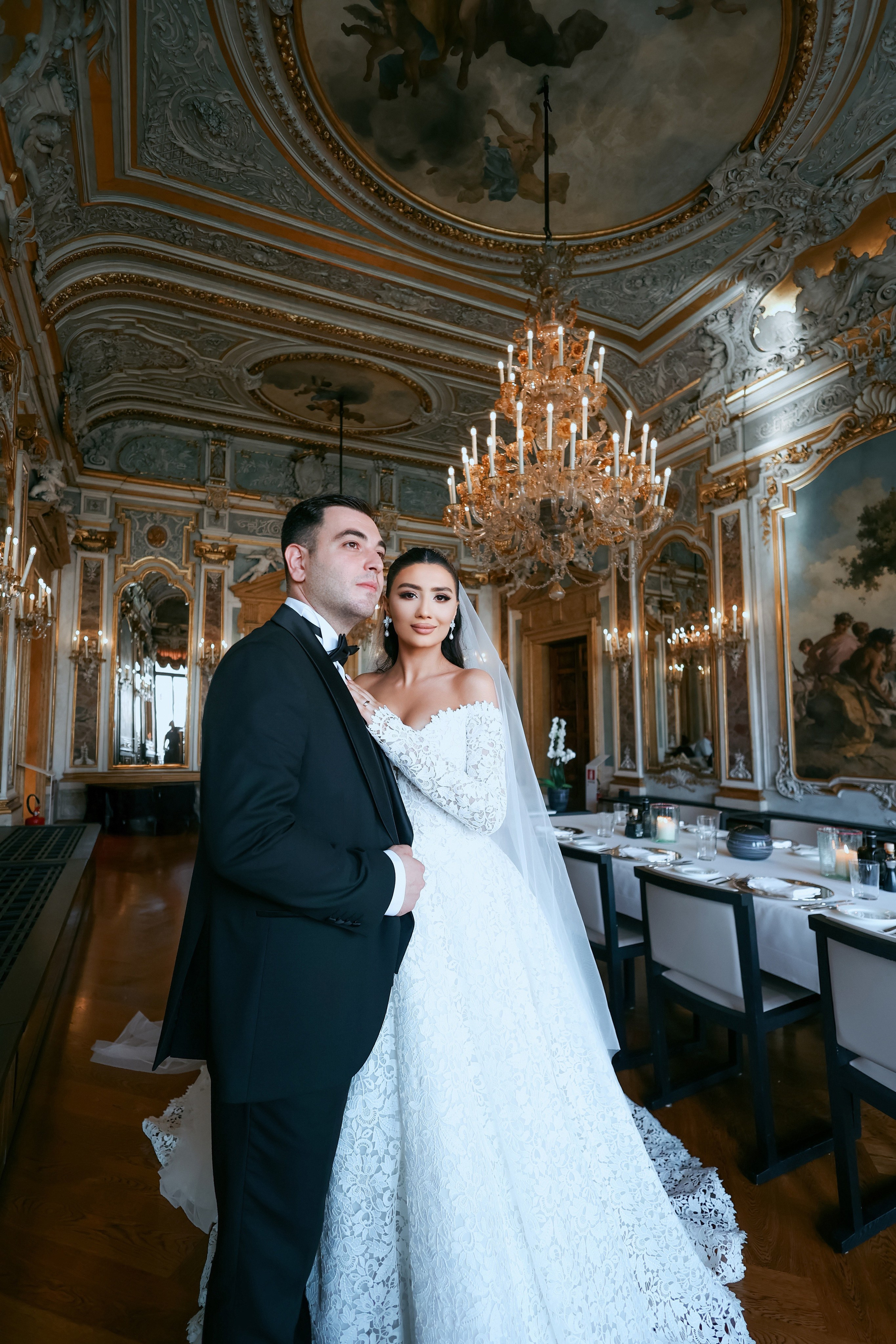 Bride and groom entering Aman hotel salon