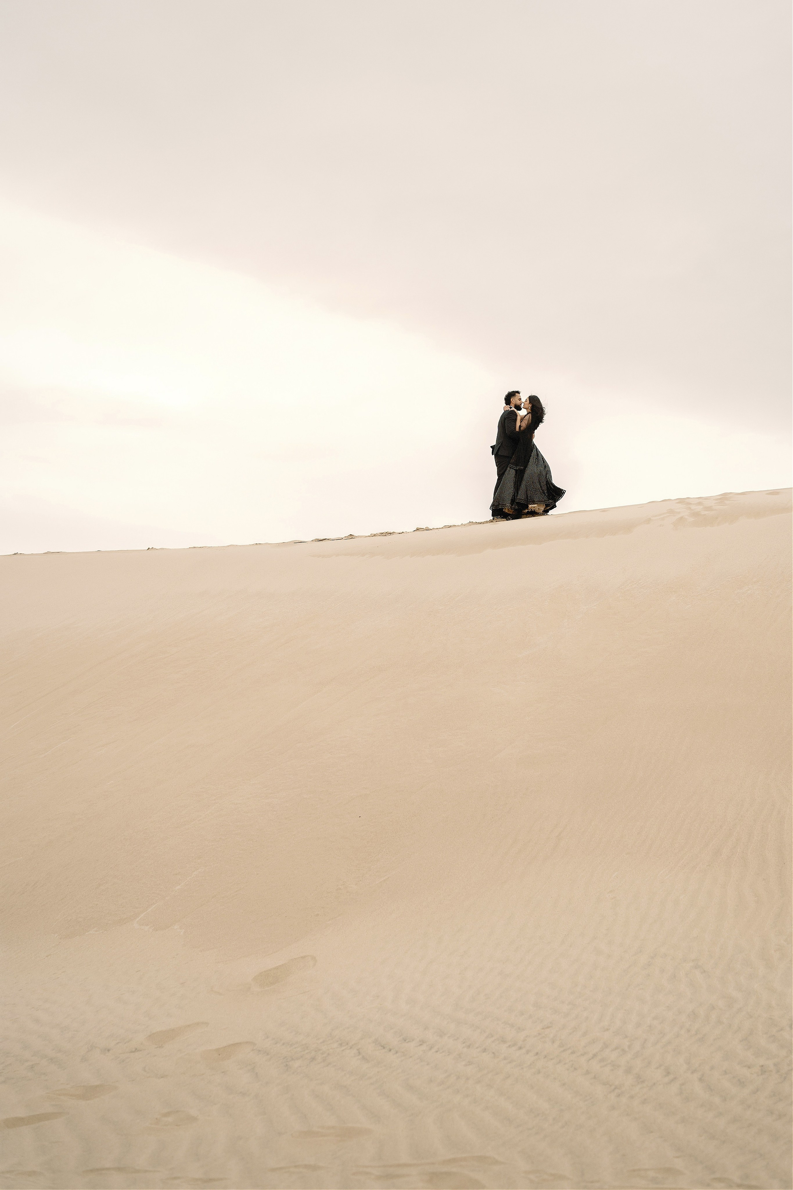 Elopement at Pismo Beach Sand Dunes, California. Wedding Photography & Videography Team in California, Los Angeles, San Francisco, San Diego and Travel
