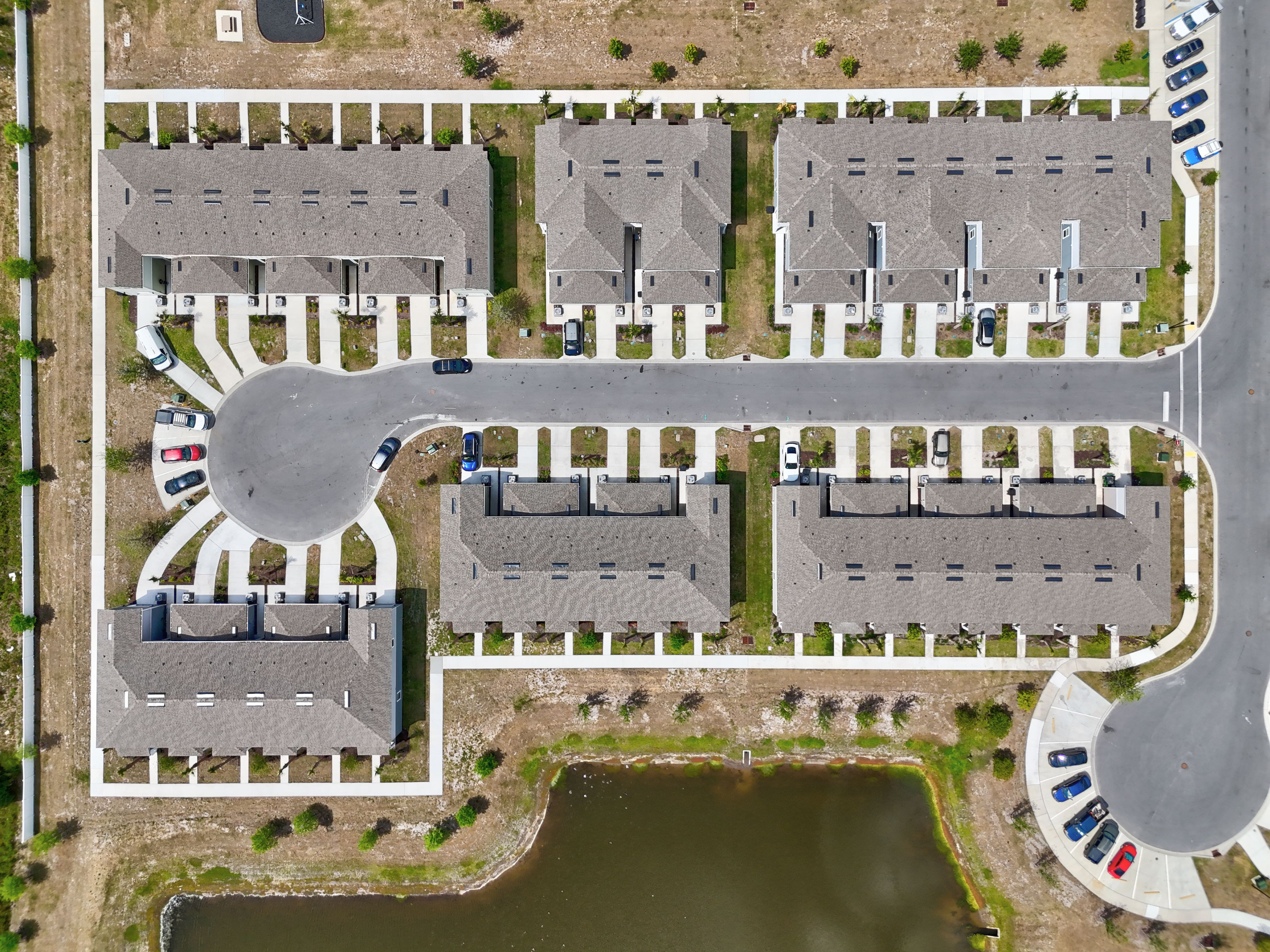 Overhead drone photo showing symmetrical residential community layout