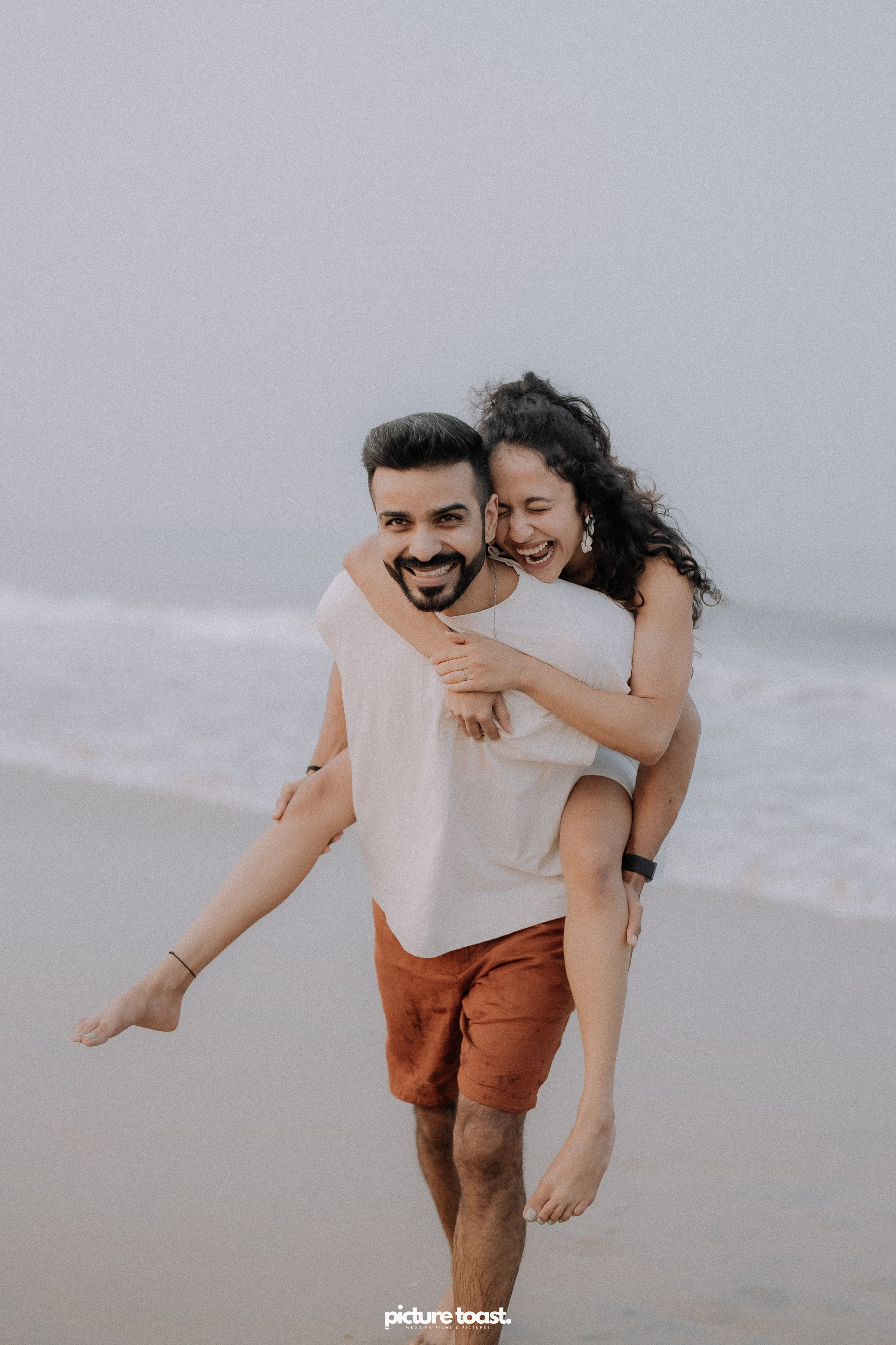 Love In The Beach. Fine art Wedding Photographers in India & Canada