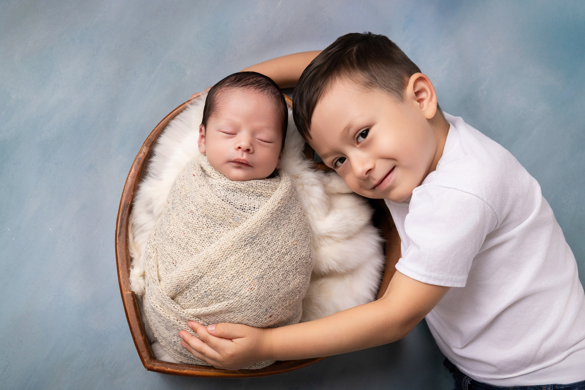 Angel Newborn Photoshoot. Professional family, maternity & newborn photographer in North Charleston, SC, creating timeless portraits