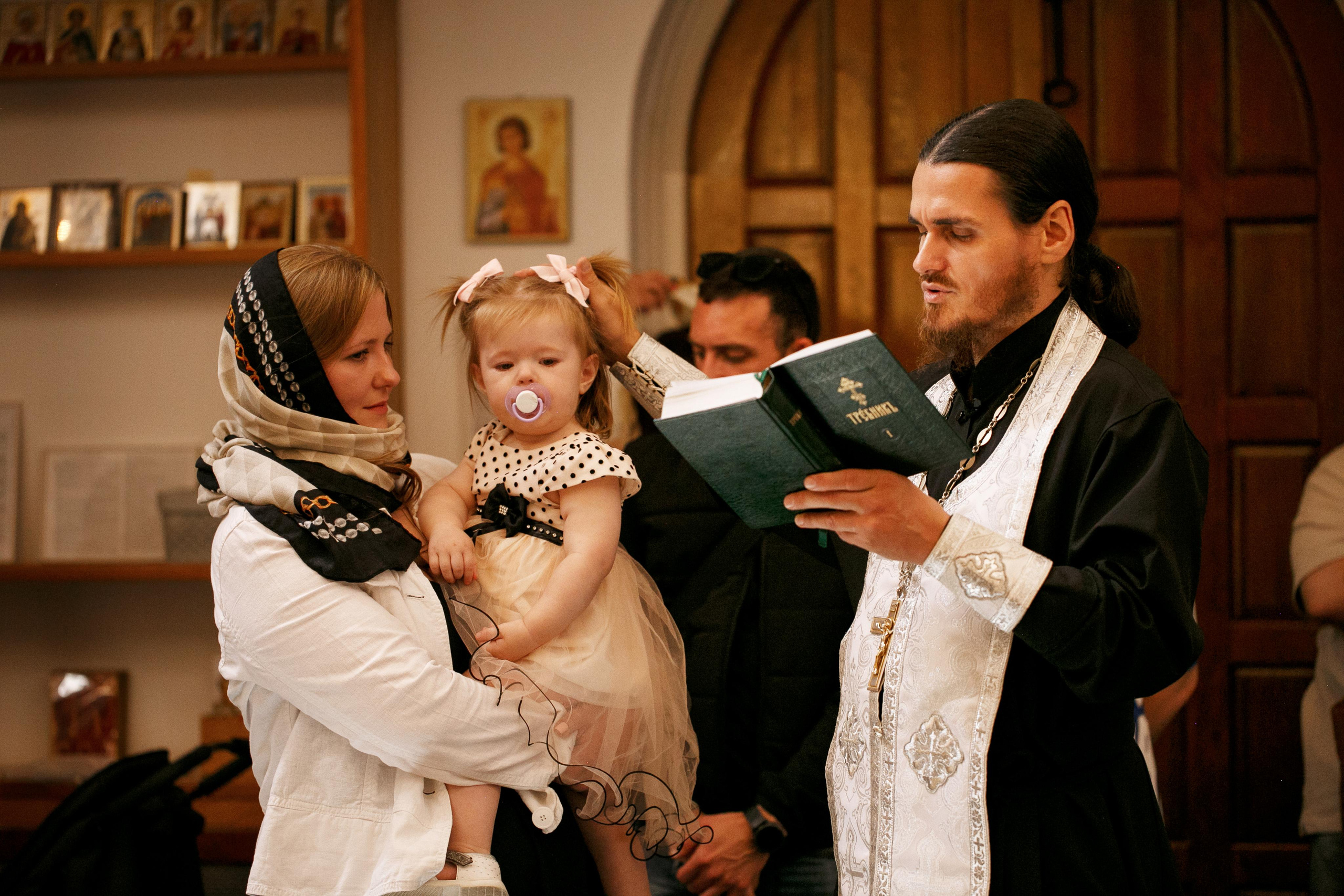 Sacrament of baptism. Photographer in the Den Haag Rotterdam Amsterdam Osypenko Oksana