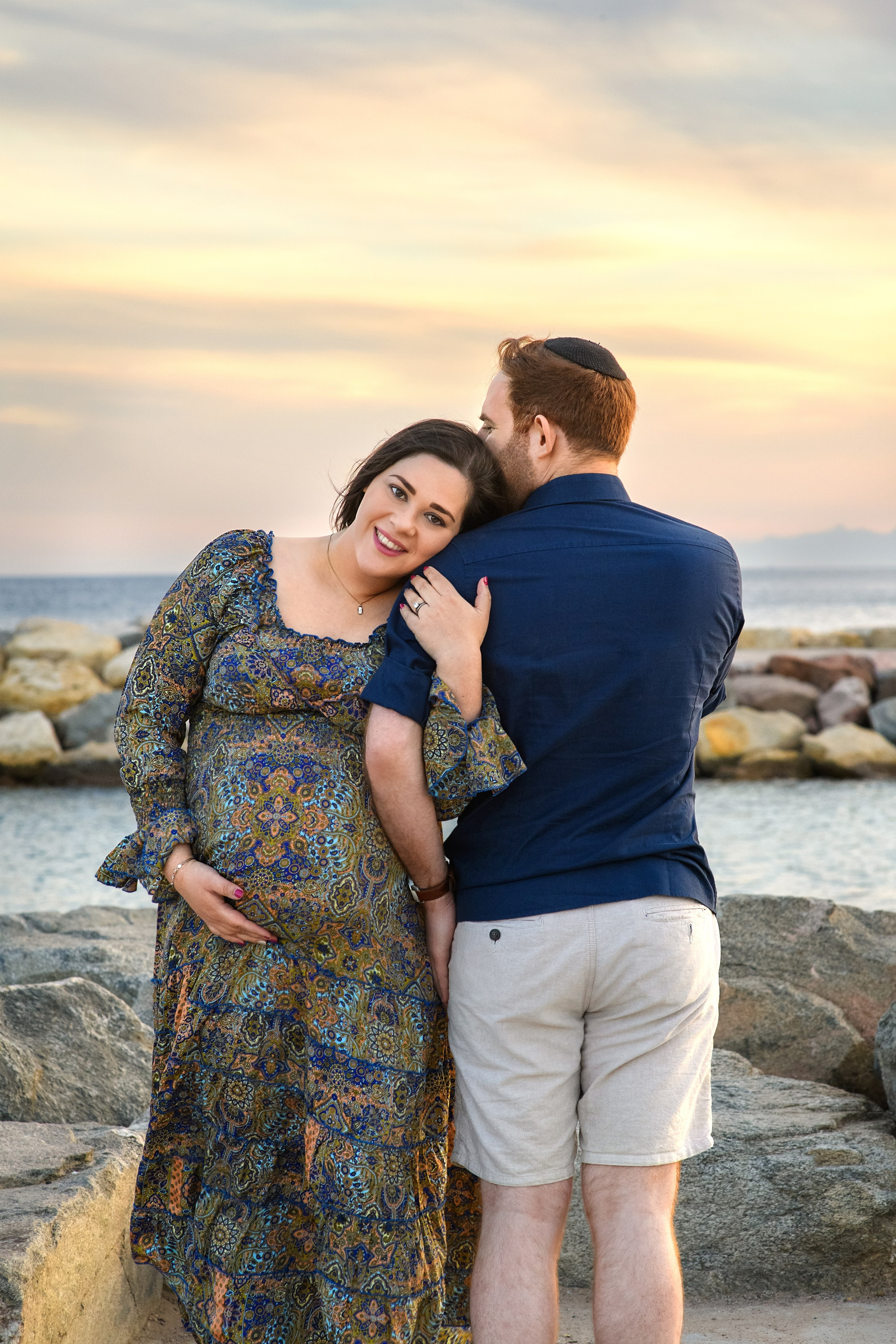 Pregnancy photoshooting for Saul and Jessica at sunset on the Red Sea. צלמת משפחה ילדים הריון וסיפורי אהבה באילת ישראל אולגה אמצ'יסלבסקי