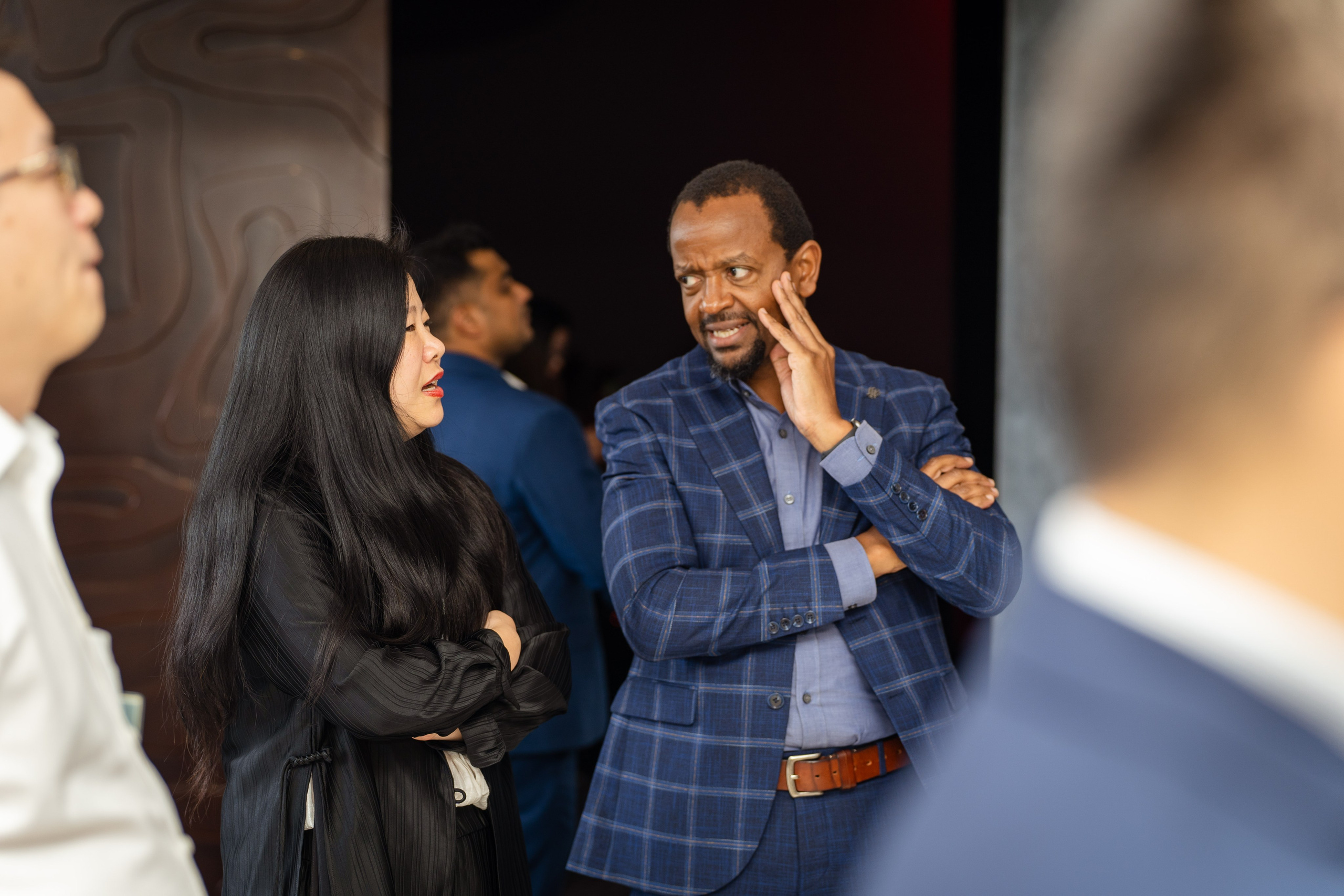 Cross-cultural networking at Radisson Blu corporate event in Nairobi