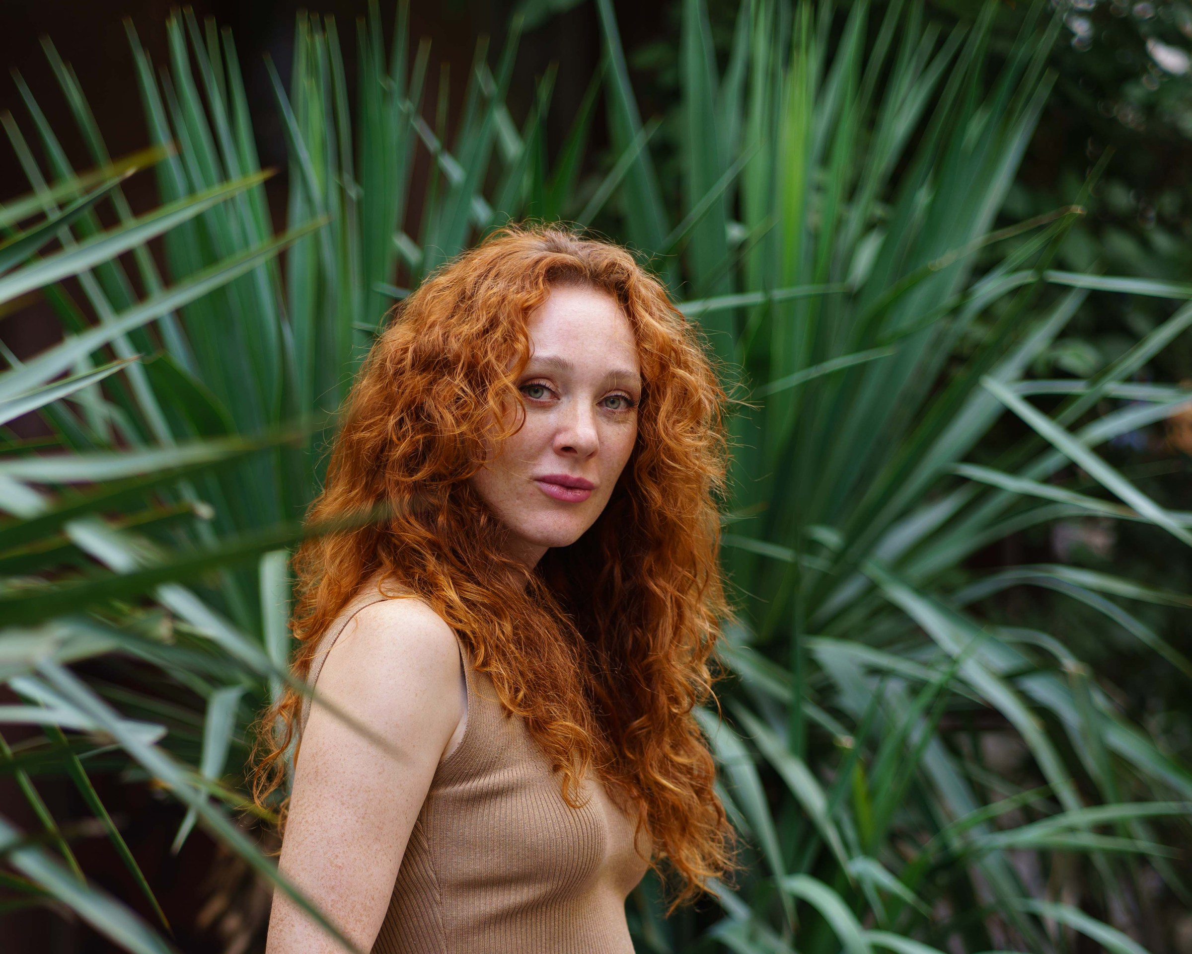 Outdoor female portrait with greenery in Sofia, Bulgaria