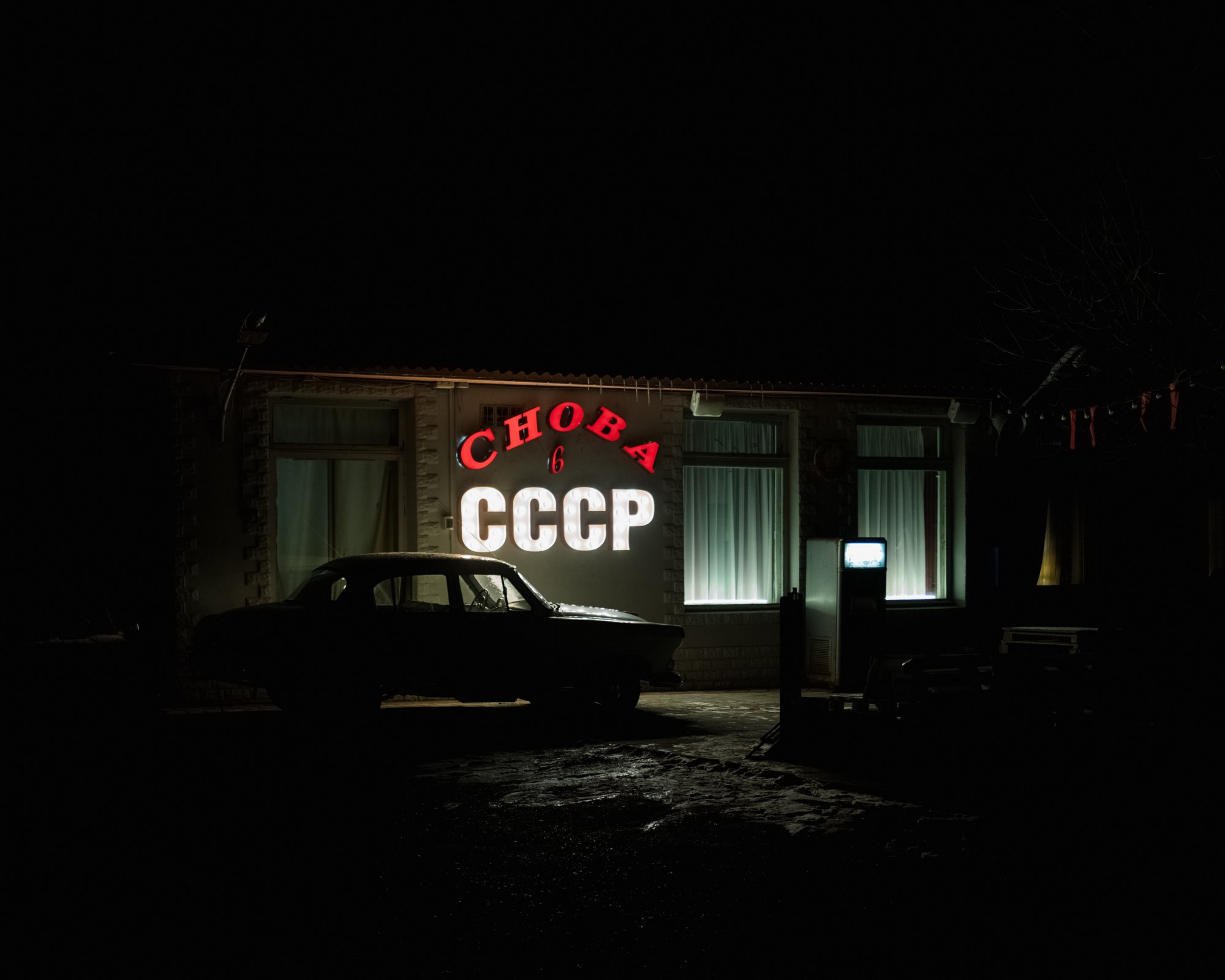 A 'Back to Soviet Union' sign displayed in the window of a theme cafe in Tiraspol. 