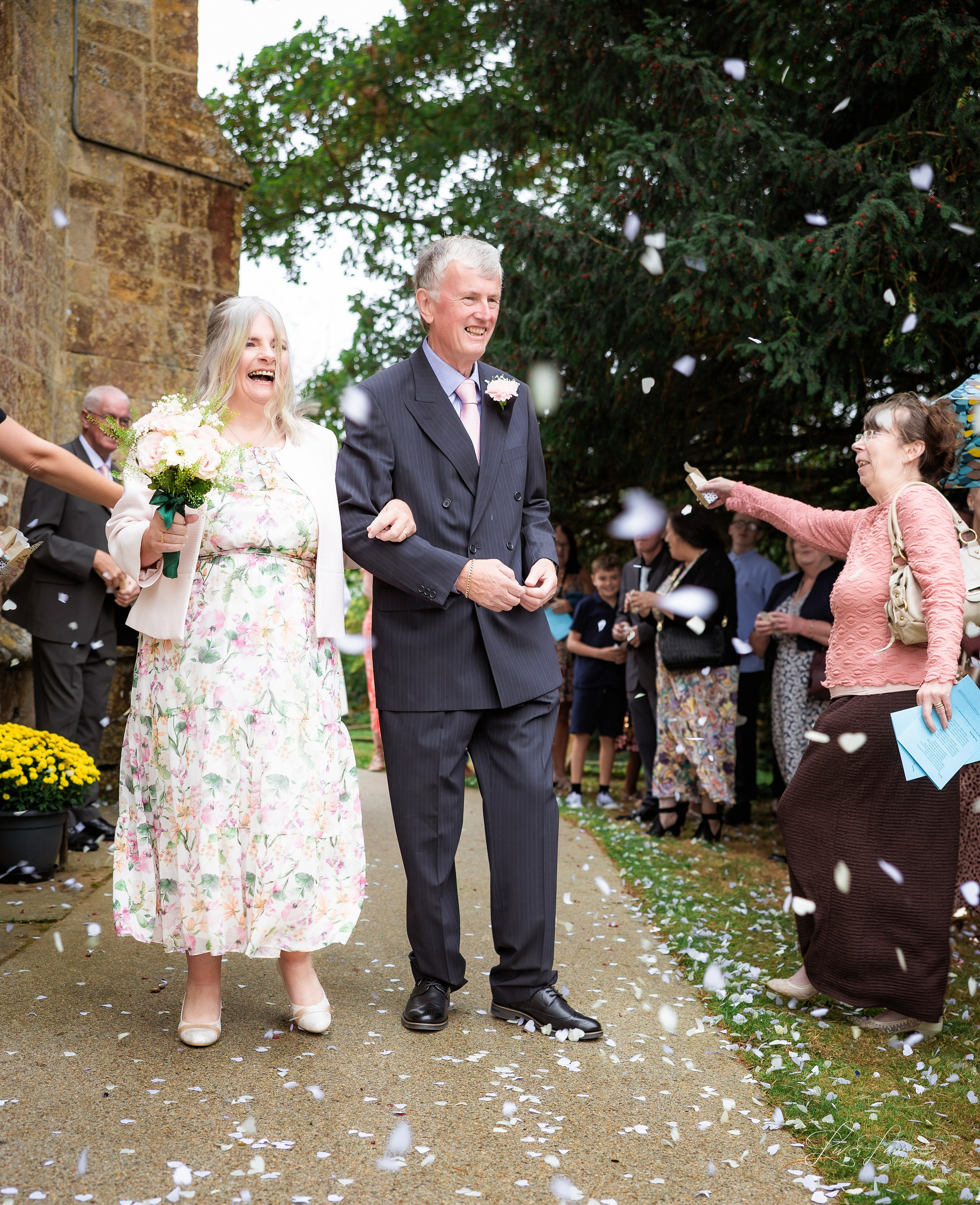 Church Wedding. Wedding and boudoir photography by Liv and Laura