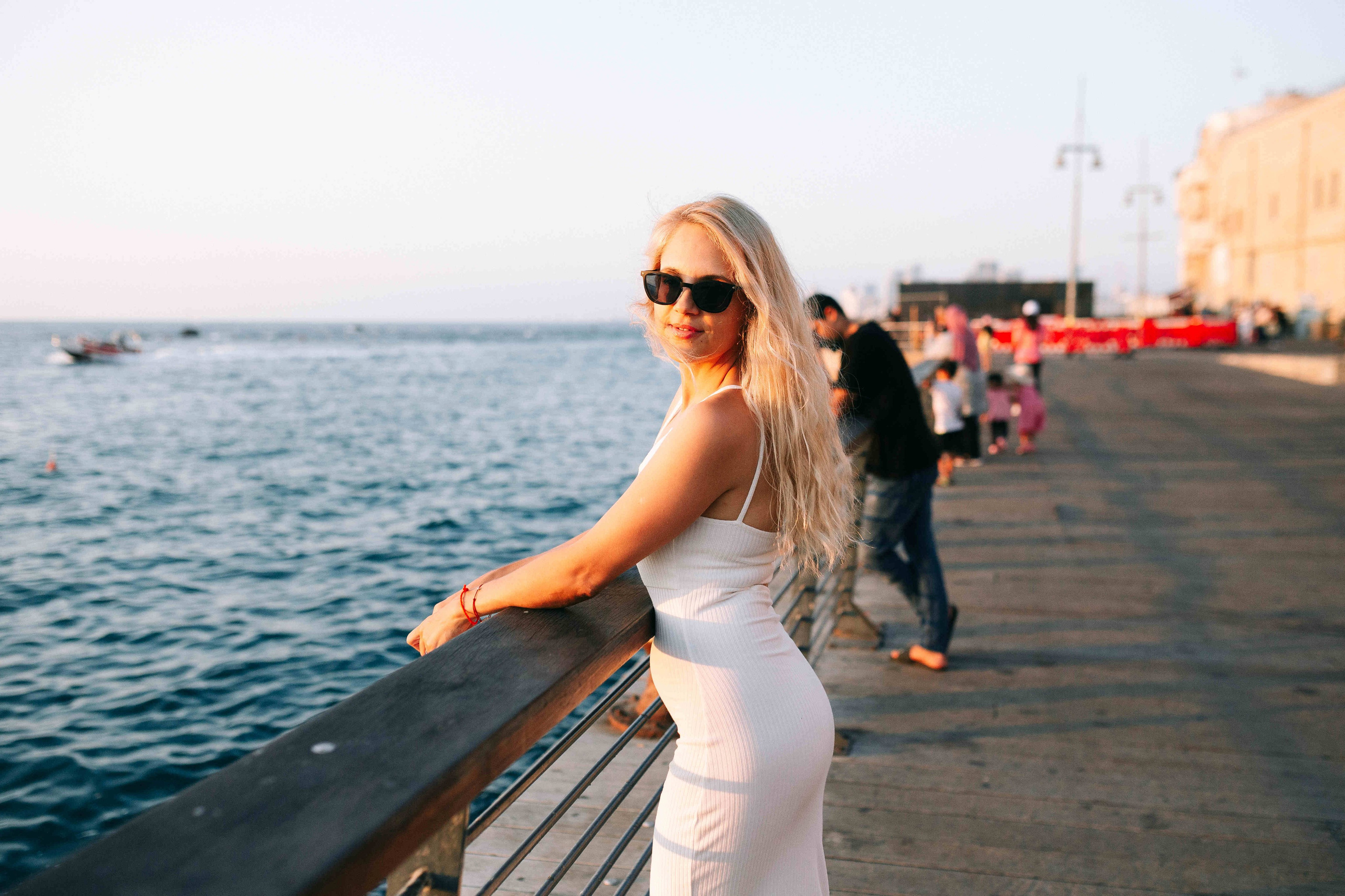 SUNSET IN JAFFO PORT. PHOTOGRAPHER IN ISRAEL