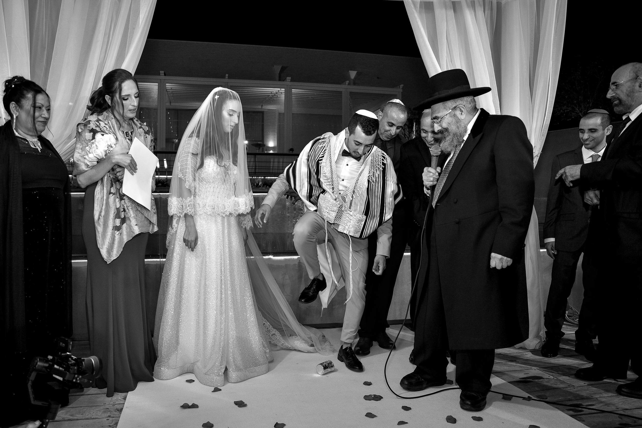 Aviad breaks the glass at the end of the chuppah ceremony