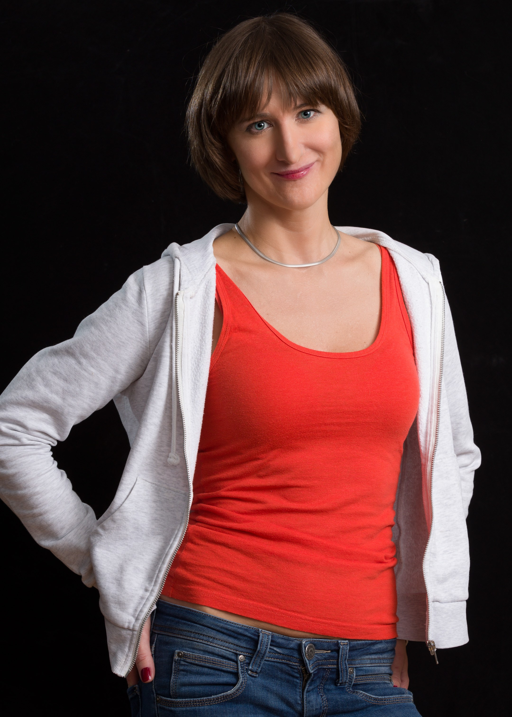 Portrait of a young lady on black studio background - photographer Andrey Dunin
