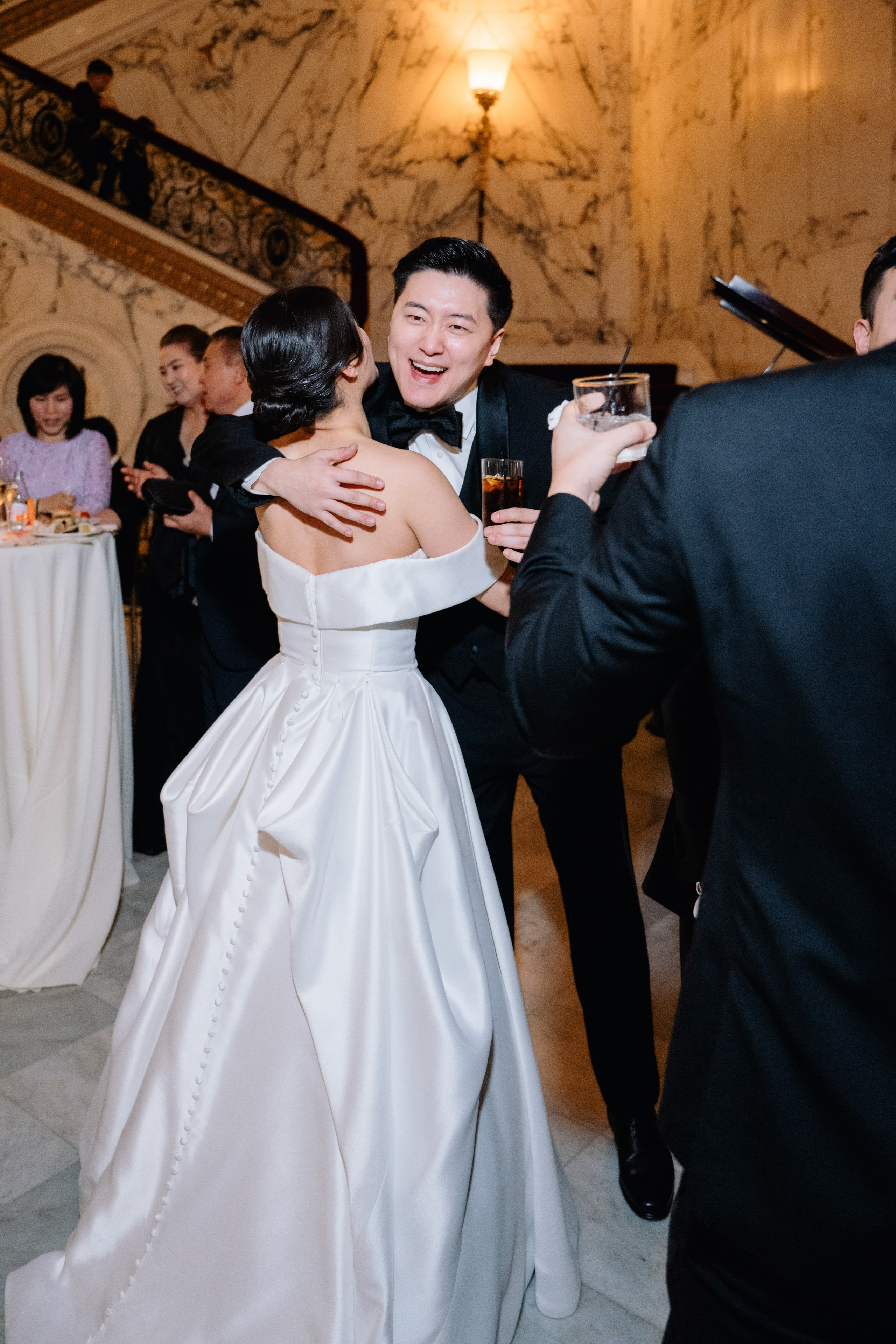 a bride and groom dancing at their wedding reception