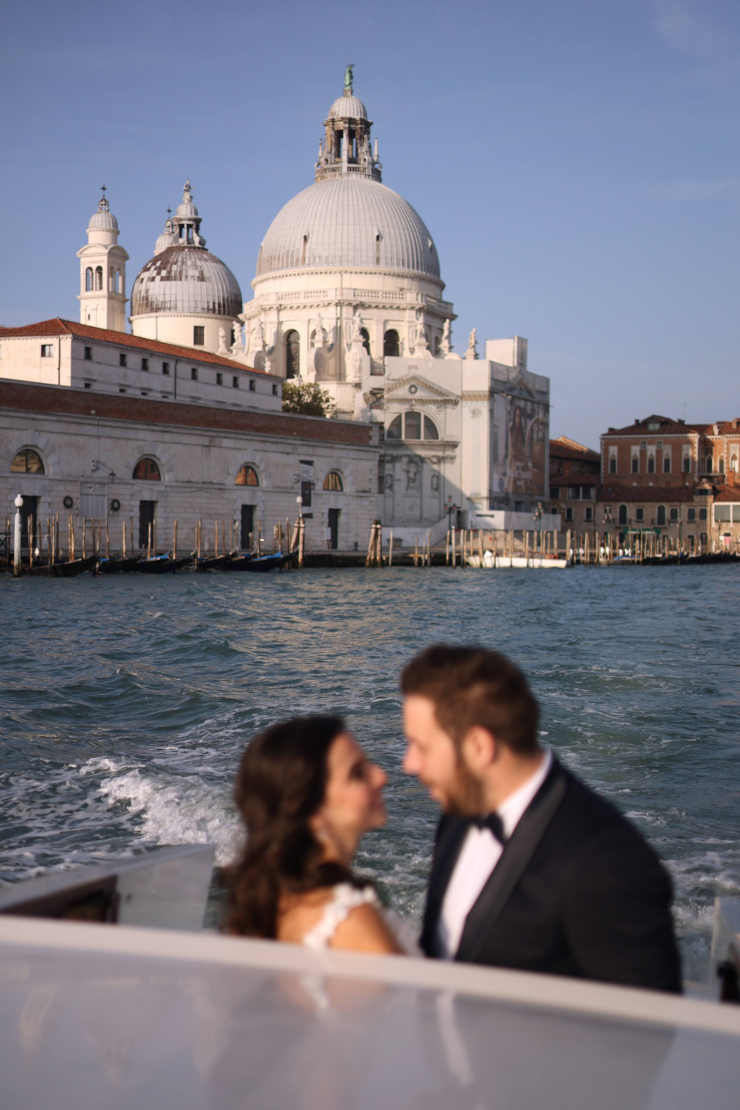 Newlyweds on the background of the Grand Canal of Venice