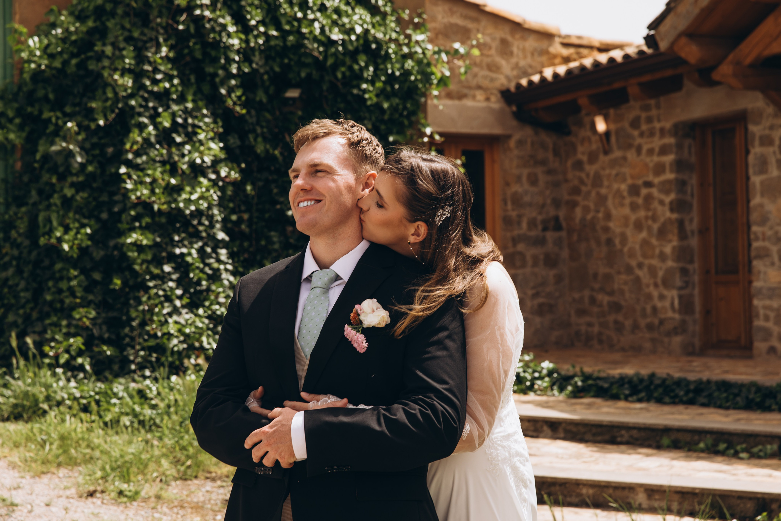 Bride walking on Barcelona beach – wedding photographer Spain.