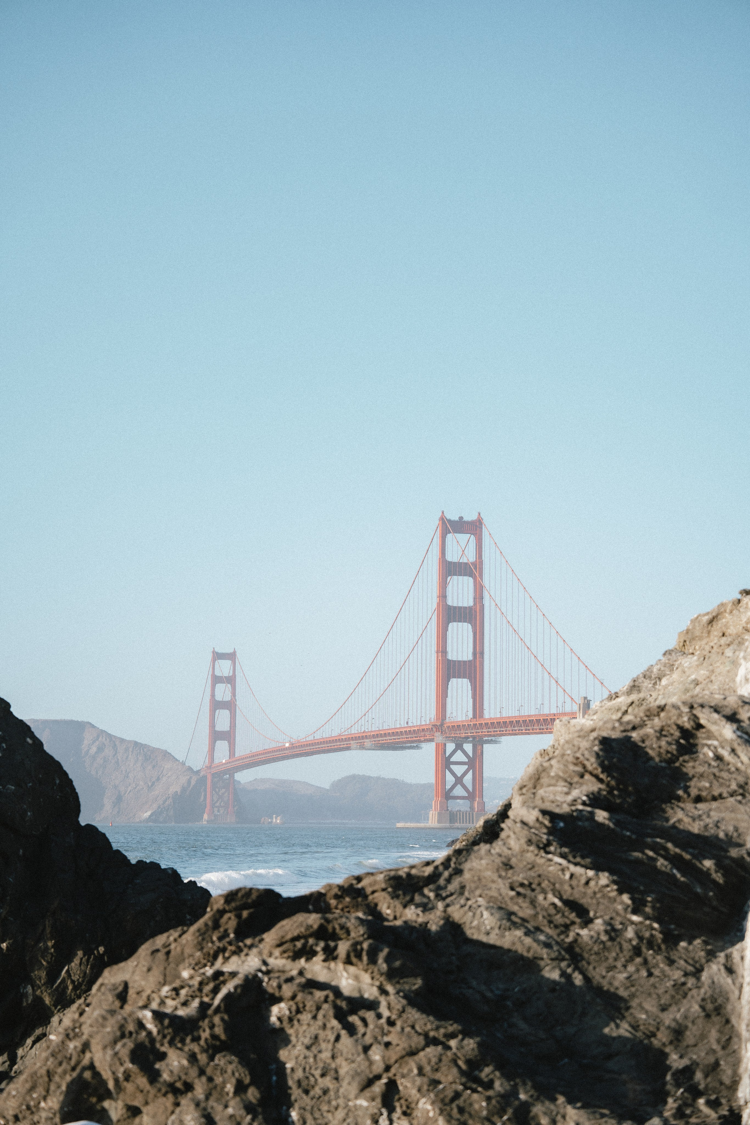 Engagement and Couple’s Photoshoot at Marshall’s Beach with iconic Golden Gate bridge view. Soulo Photography | San Francisco Bay Area Based Photographer