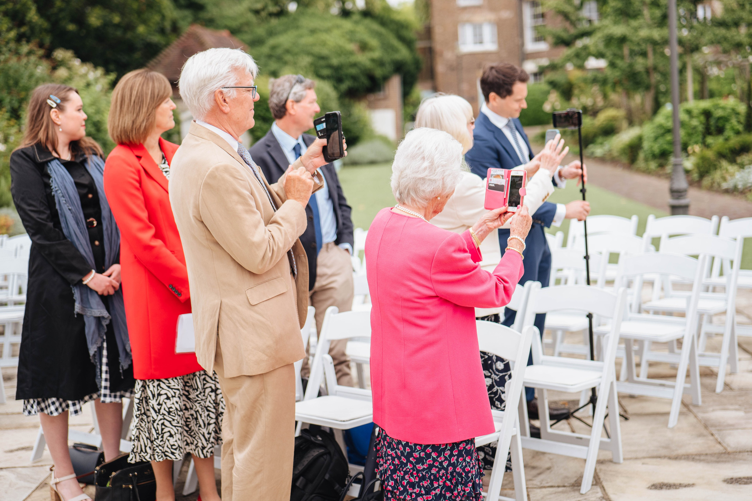 guests happy seeing bride and her father at the venue