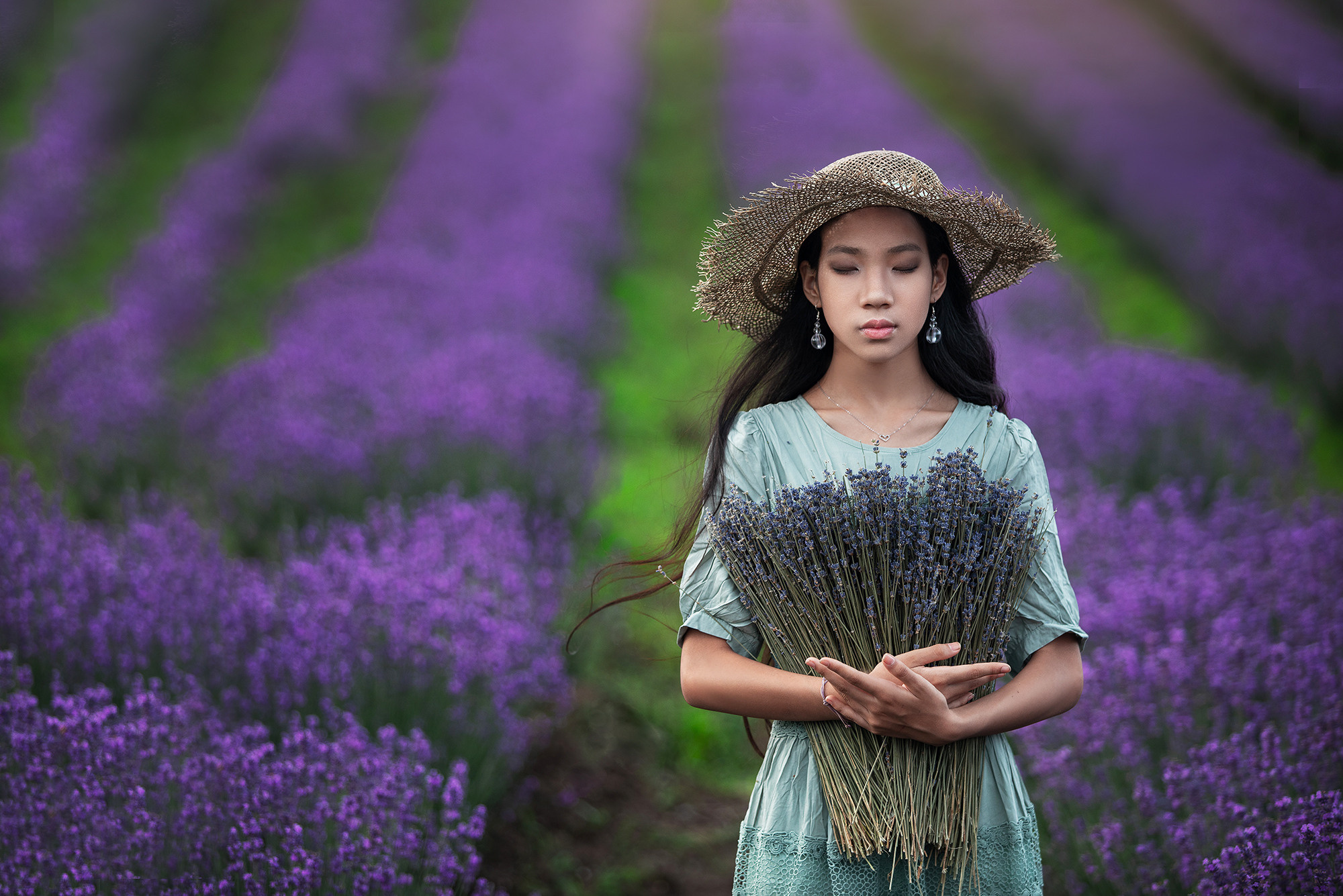Photo shoot in lavender fields in Shanghai. Photographer Lola Pidluskaya holds annual photo shoots in lavender fields in May