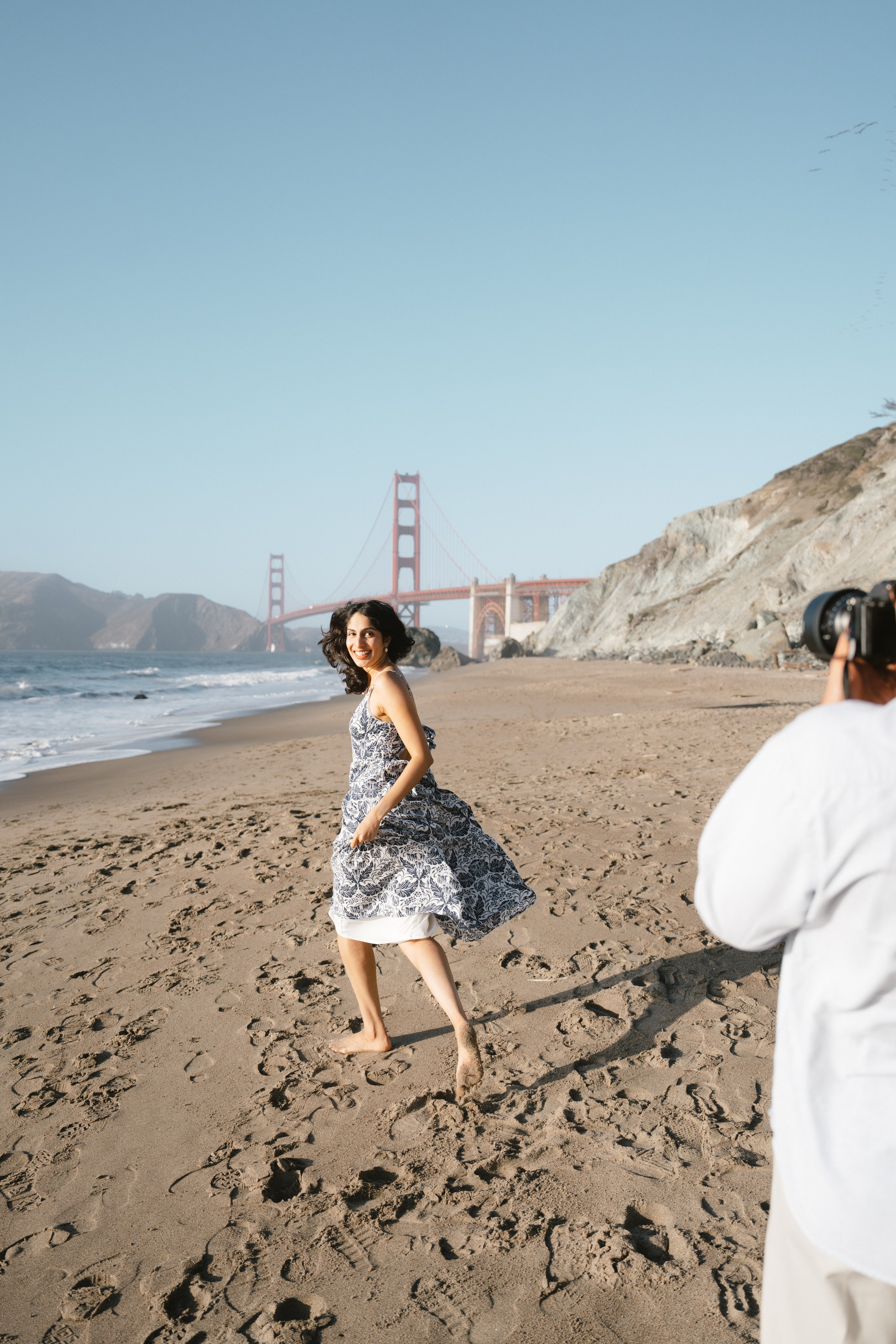 Engagement and Couple’s Photoshoot at Marshall’s Beach with iconic Golden Gate bridge view. Soulo Photography | San Francisco Bay Area Based Photographer
