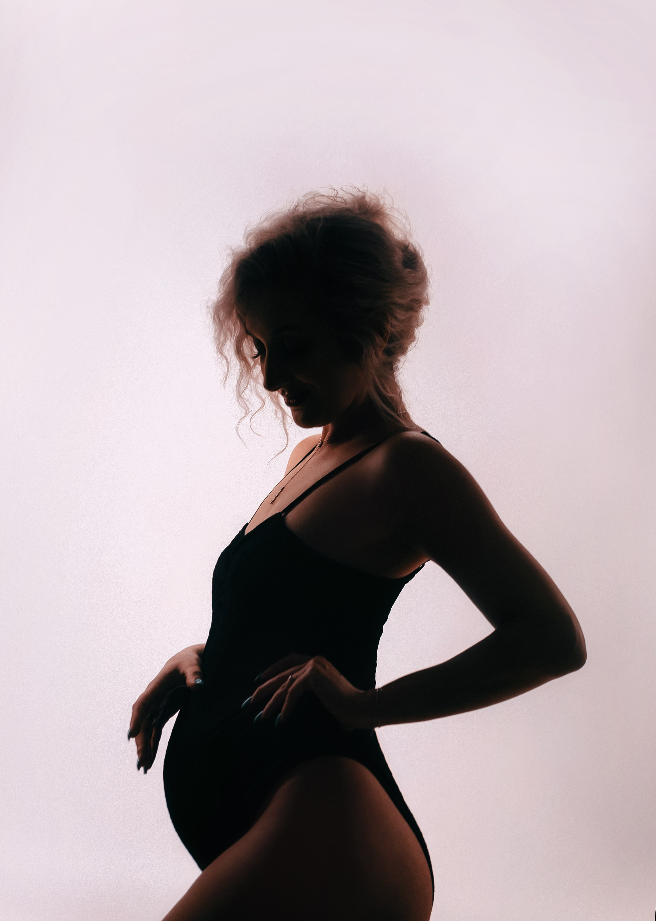 Studio pregnancy photoshooting for Alina and Michael. Home