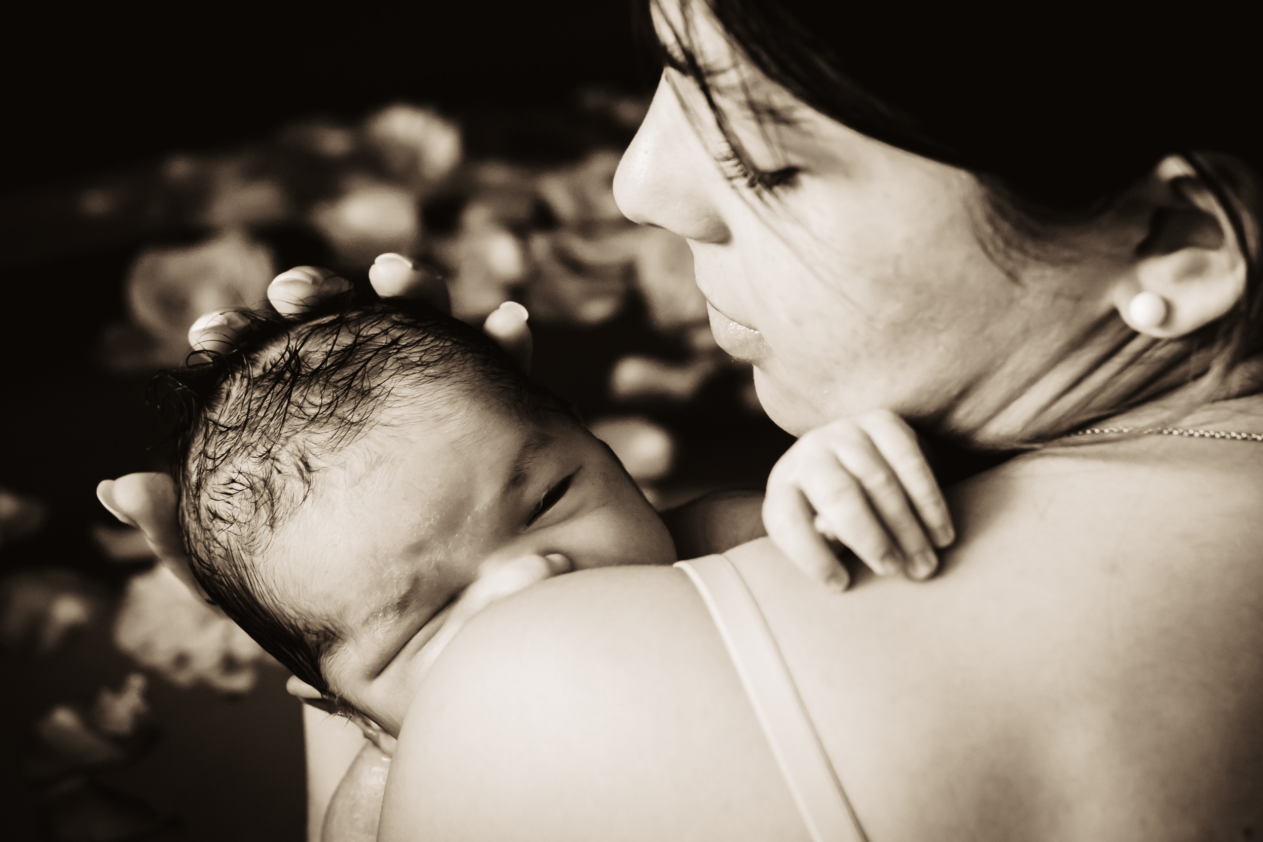 Monika, Pool newborn shooting. Family photographer Aargau Zurich