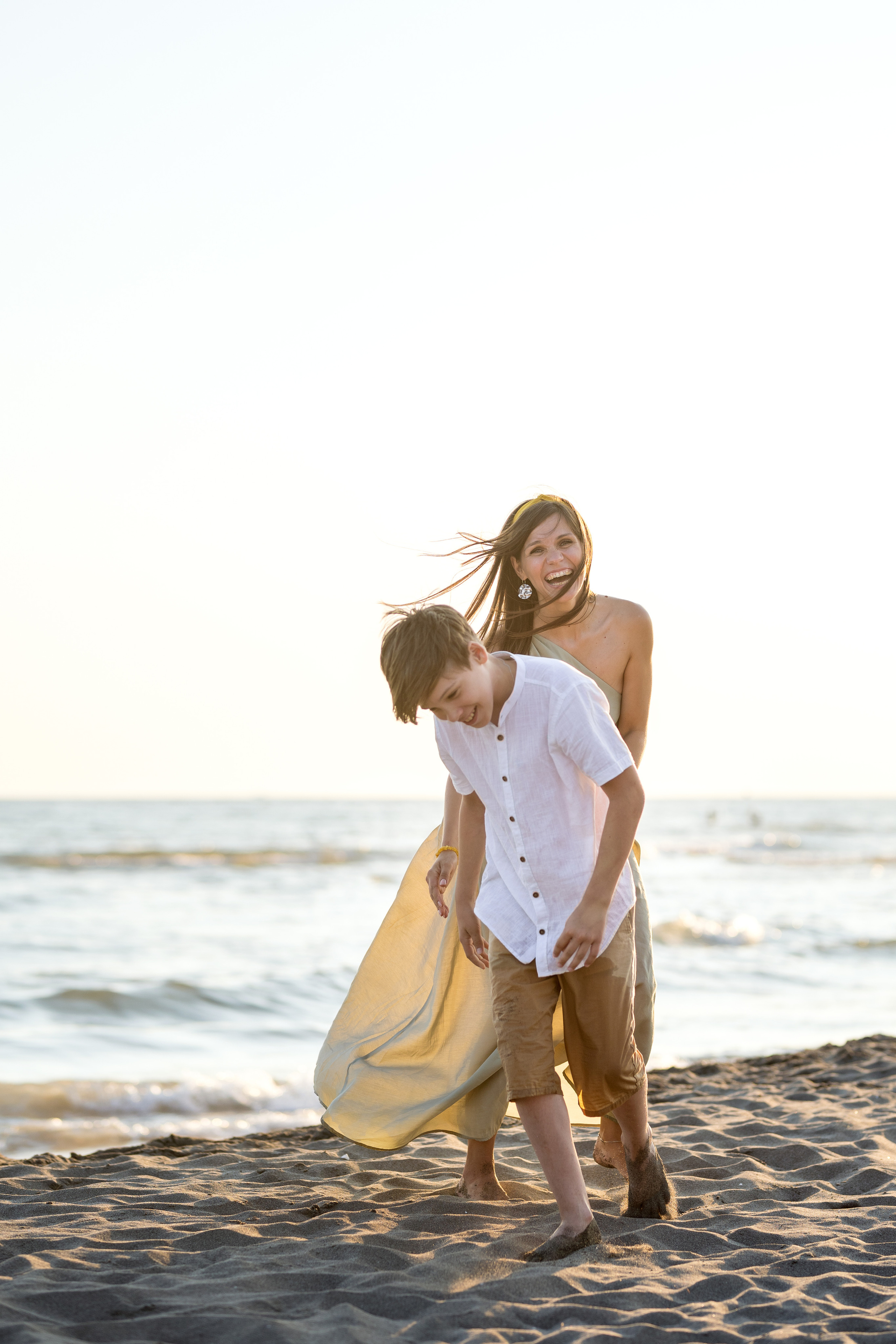 Закатная съёмка семьи на морском побережье. Катя Халдеева Фотограф Саратов