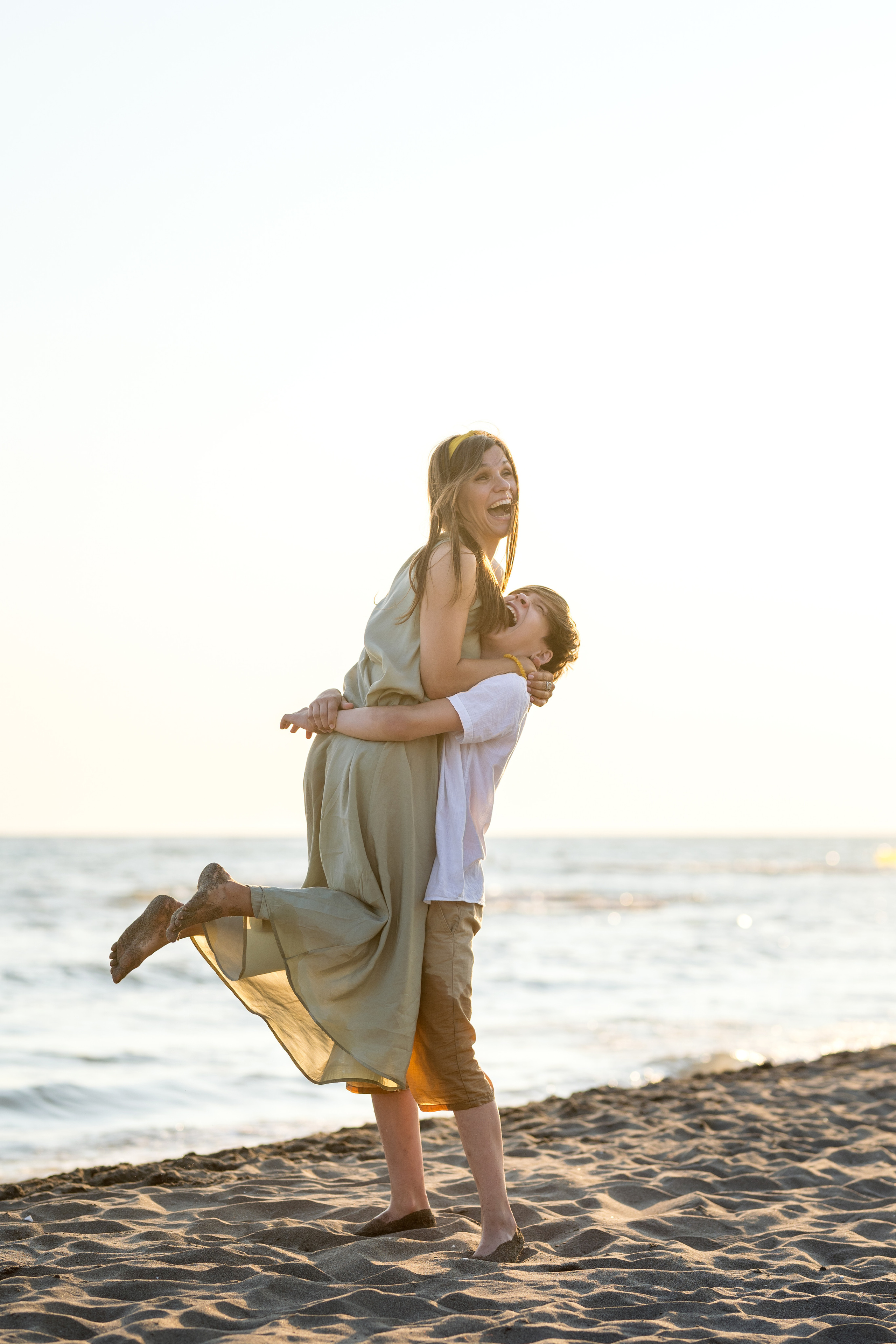 Закатная съёмка семьи на морском побережье. Катя Халдеева Фотограф Саратов