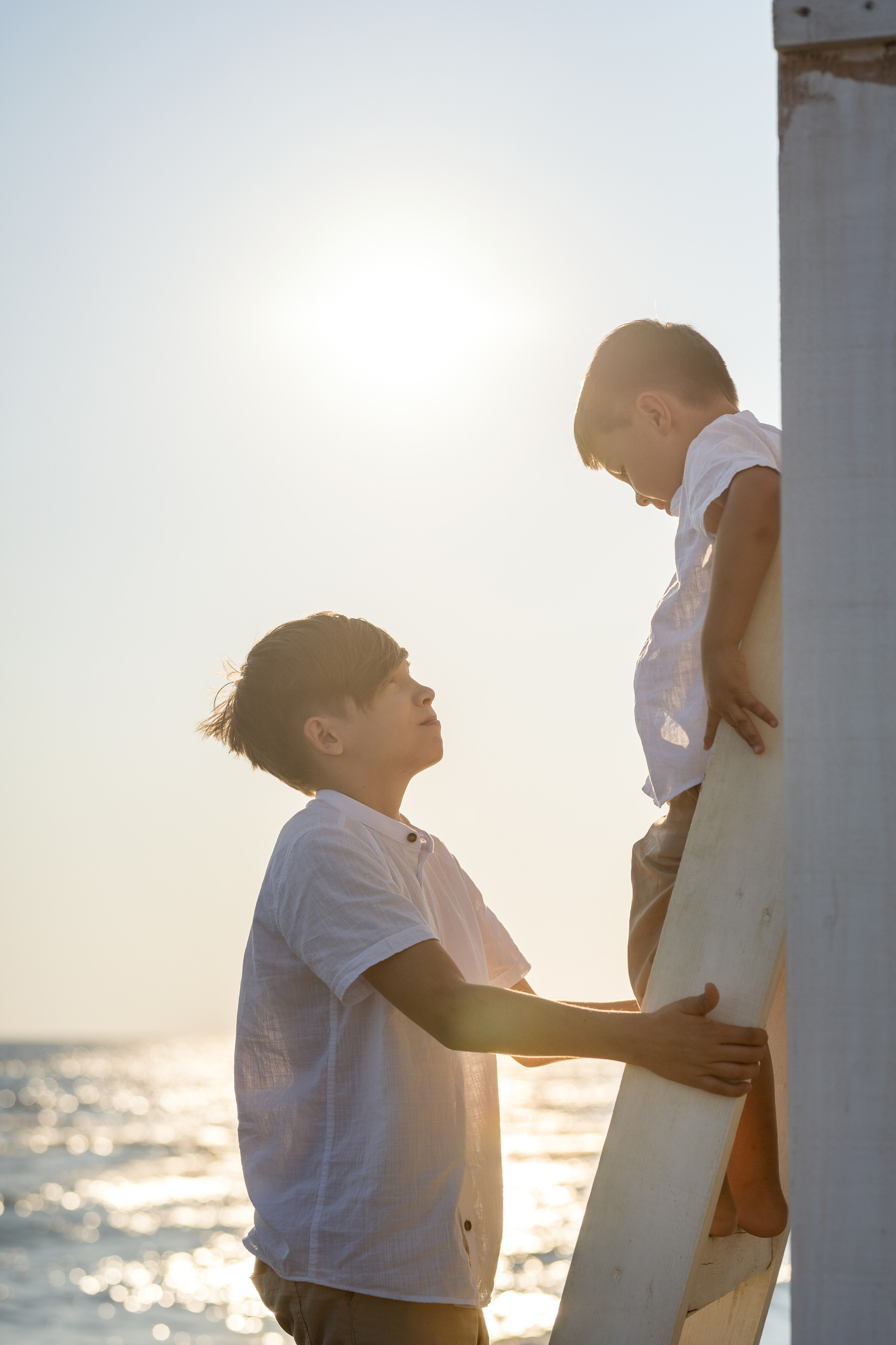 Закатная съёмка семьи на морском побережье. Катя Халдеева Фотограф Саратов