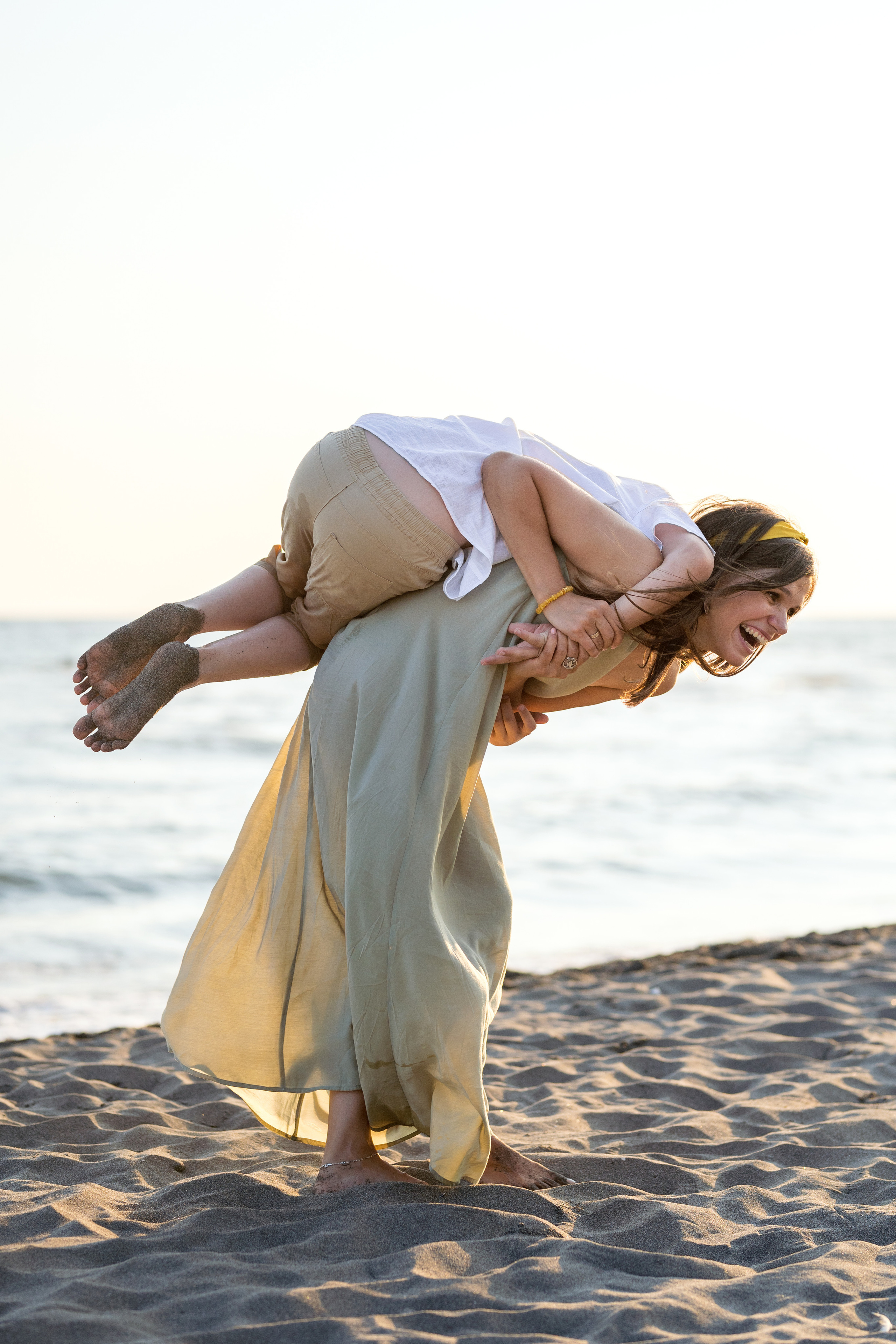 Закатная съёмка семьи на морском побережье. Катя Халдеева Фотограф Саратов