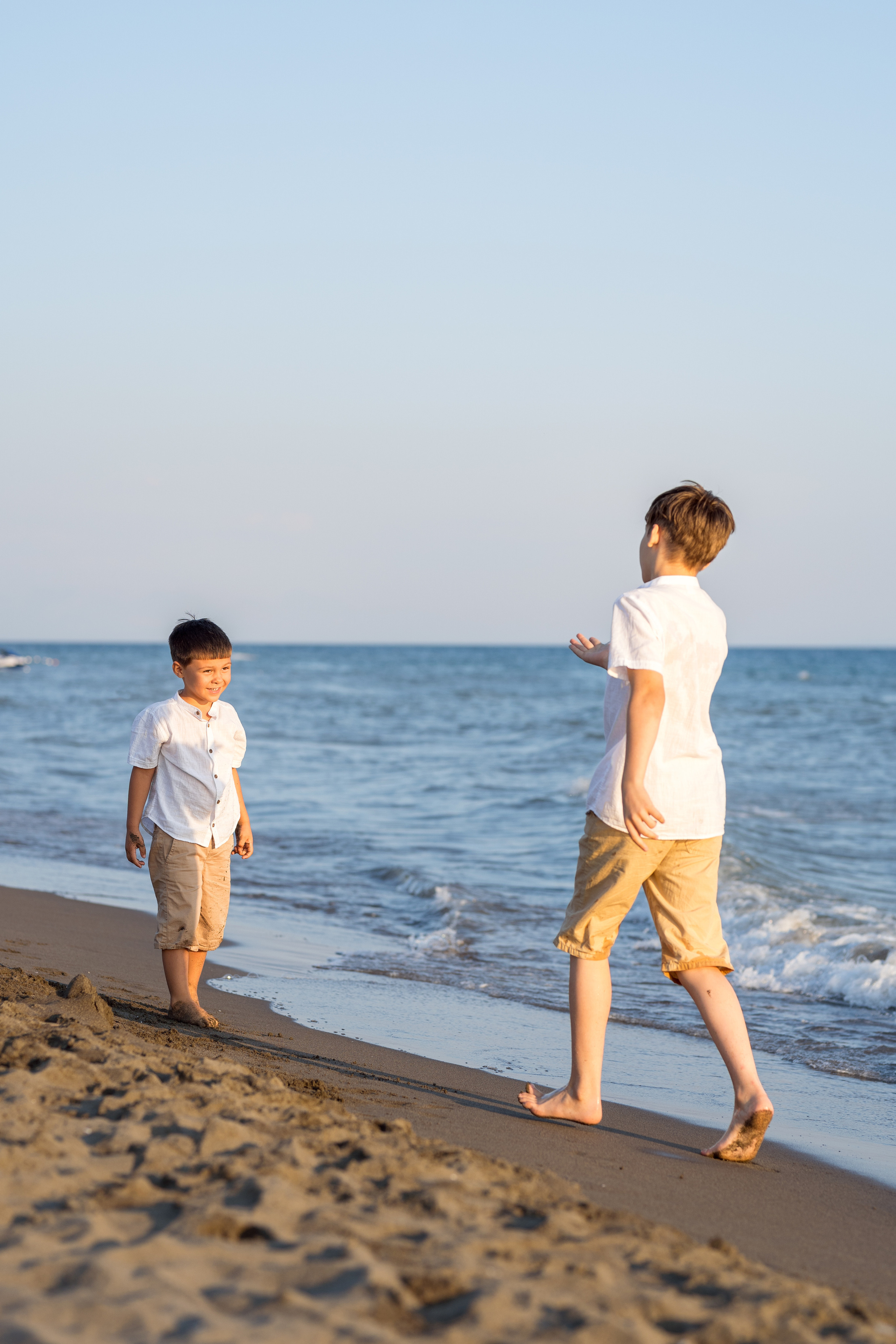 Закатная съёмка семьи на морском побережье. Катя Халдеева Фотограф Саратов