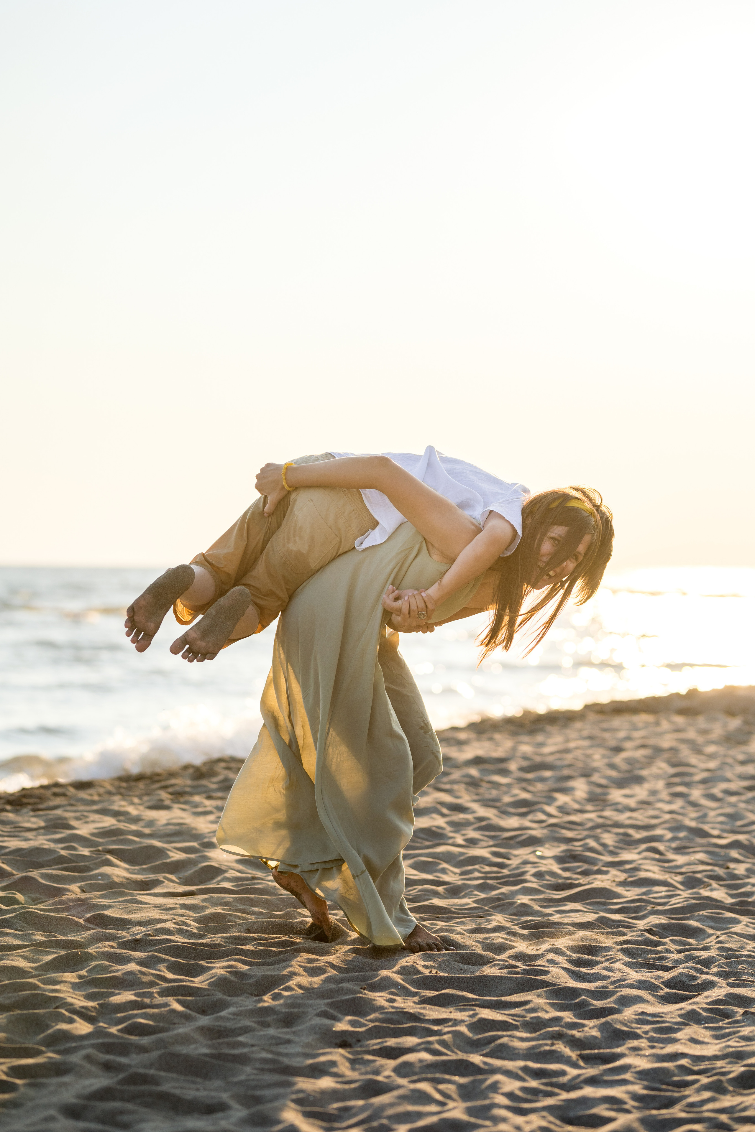 Закатная съёмка семьи на морском побережье. Катя Халдеева Фотограф Саратов