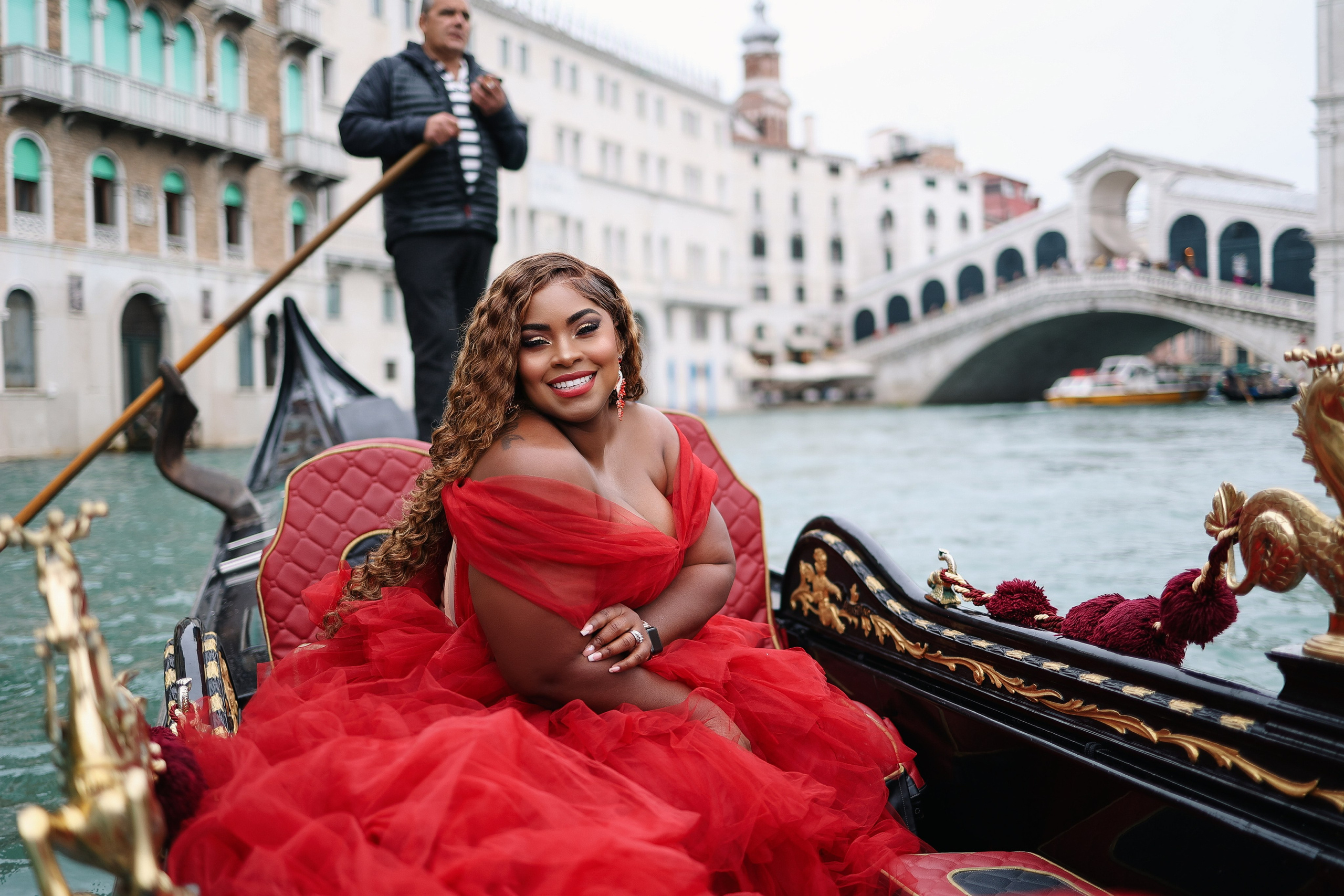 dark-skinned girl on a gondola ride in Venice 
