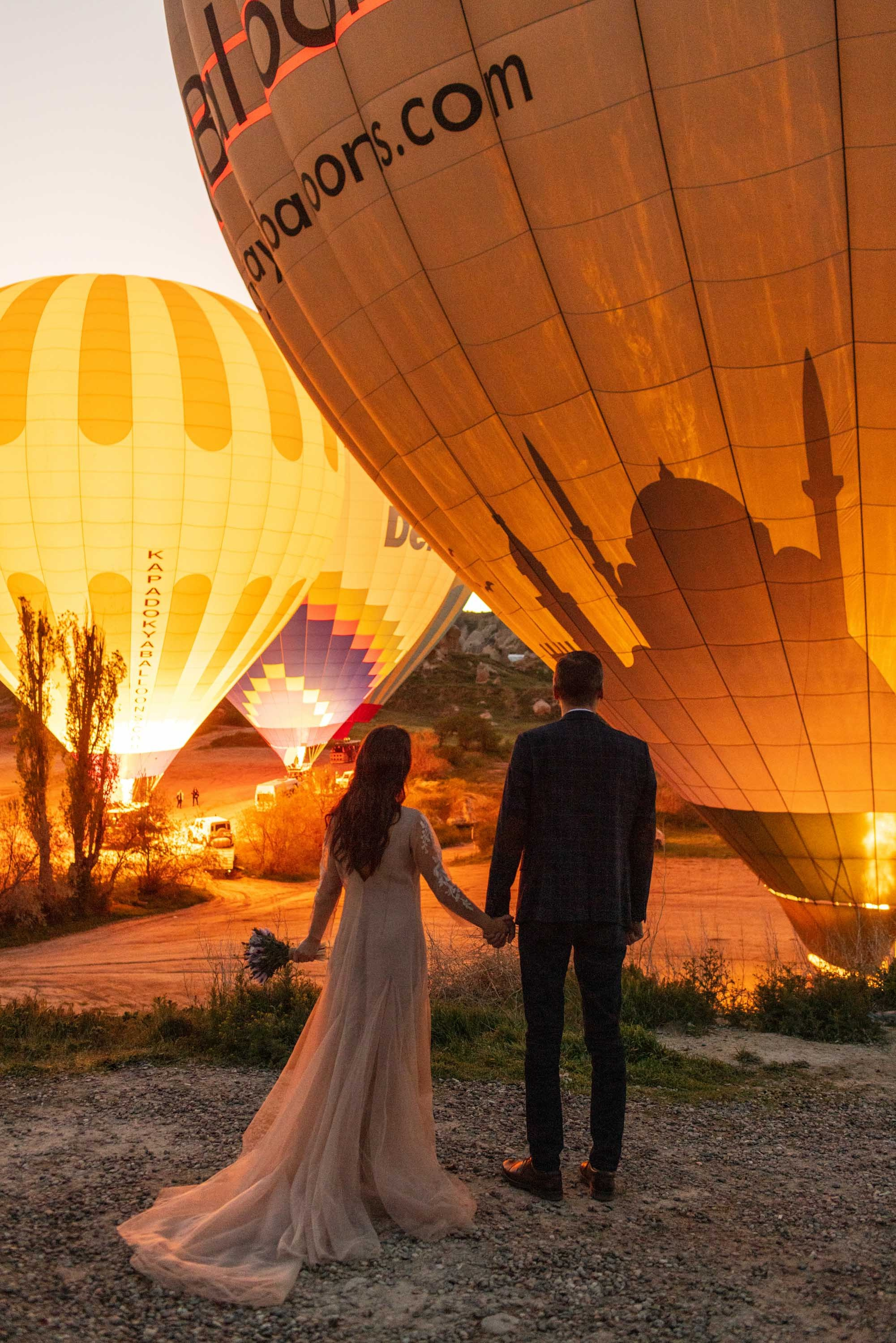 Magical Wedding Photoshoot in Cappadocia: Balloons, Caves, and Valleys. Julia Ganch I Fashion Wedding Photography I Cappadocia Turkey