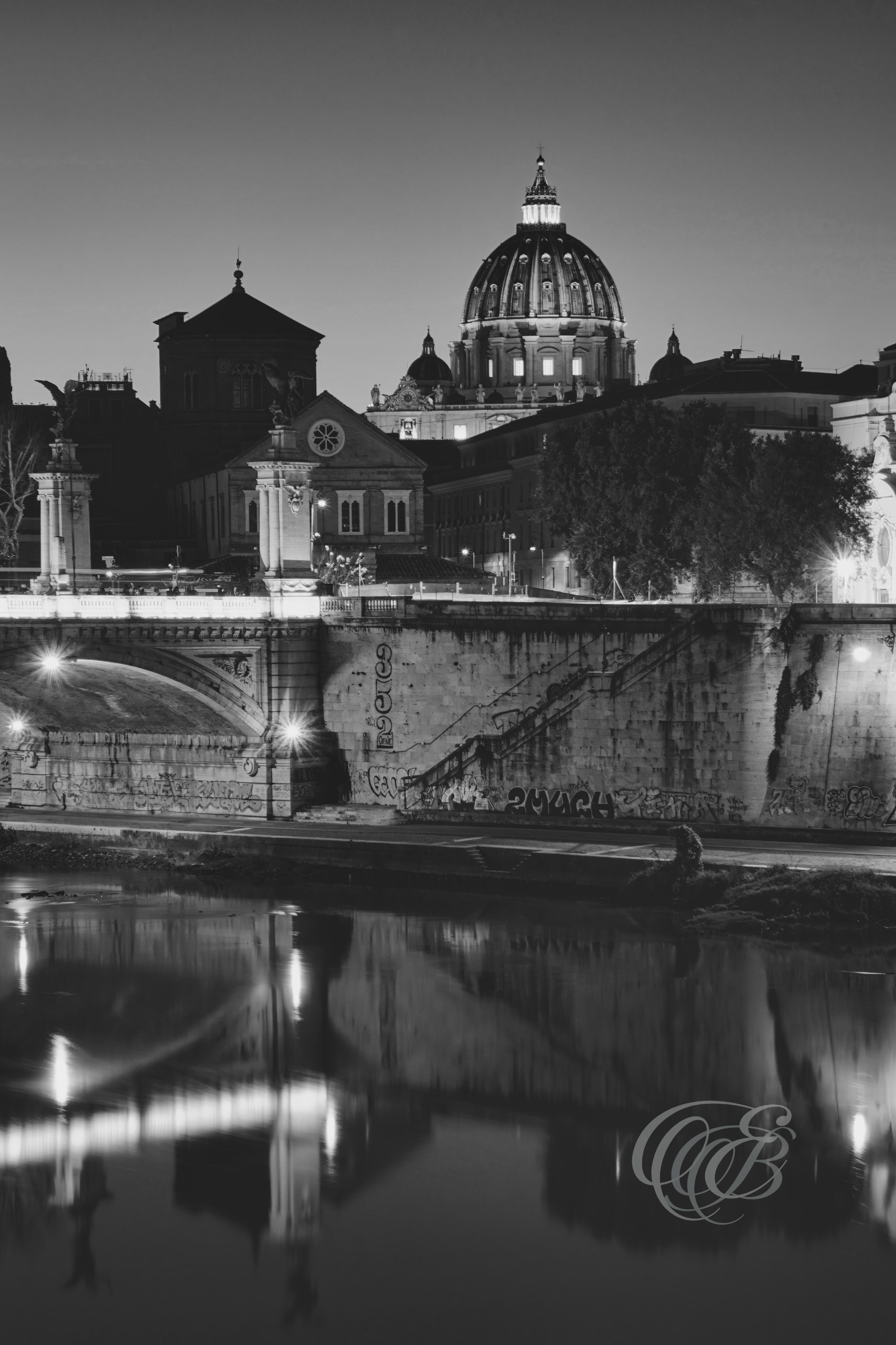 Rome Italy - Sunset at Ponte Vittorio Emanuele II - Eduardo Bartoli Fine Art Photography - Black and white matte fine art photograph of Ponte Vittorio Emanuele II with the Vatican dome in the background at sunset, Rome, Italy – photography by Eduardo Bartoli.