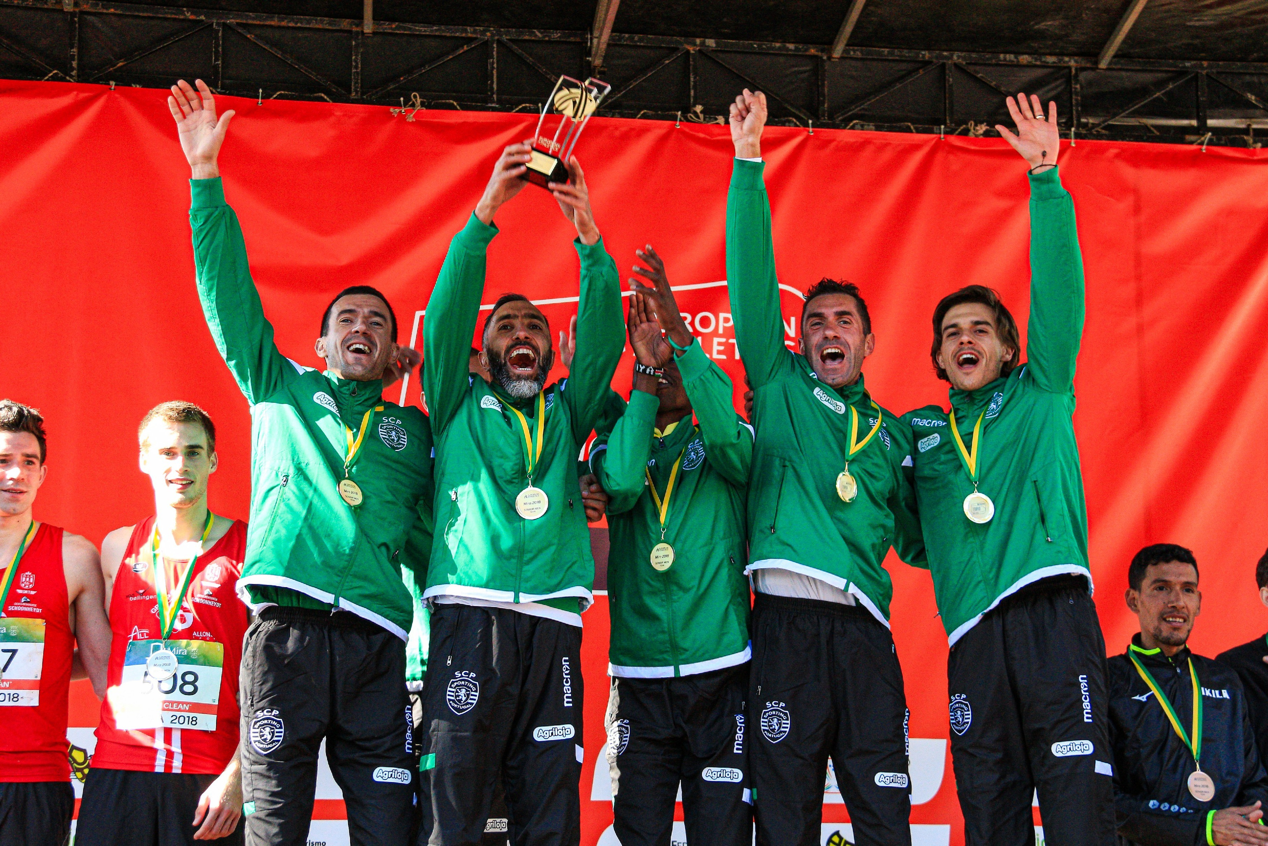 Sporting Clube de Portugal celebrating on the podium at the Cross Country European Clubs Cup 2018