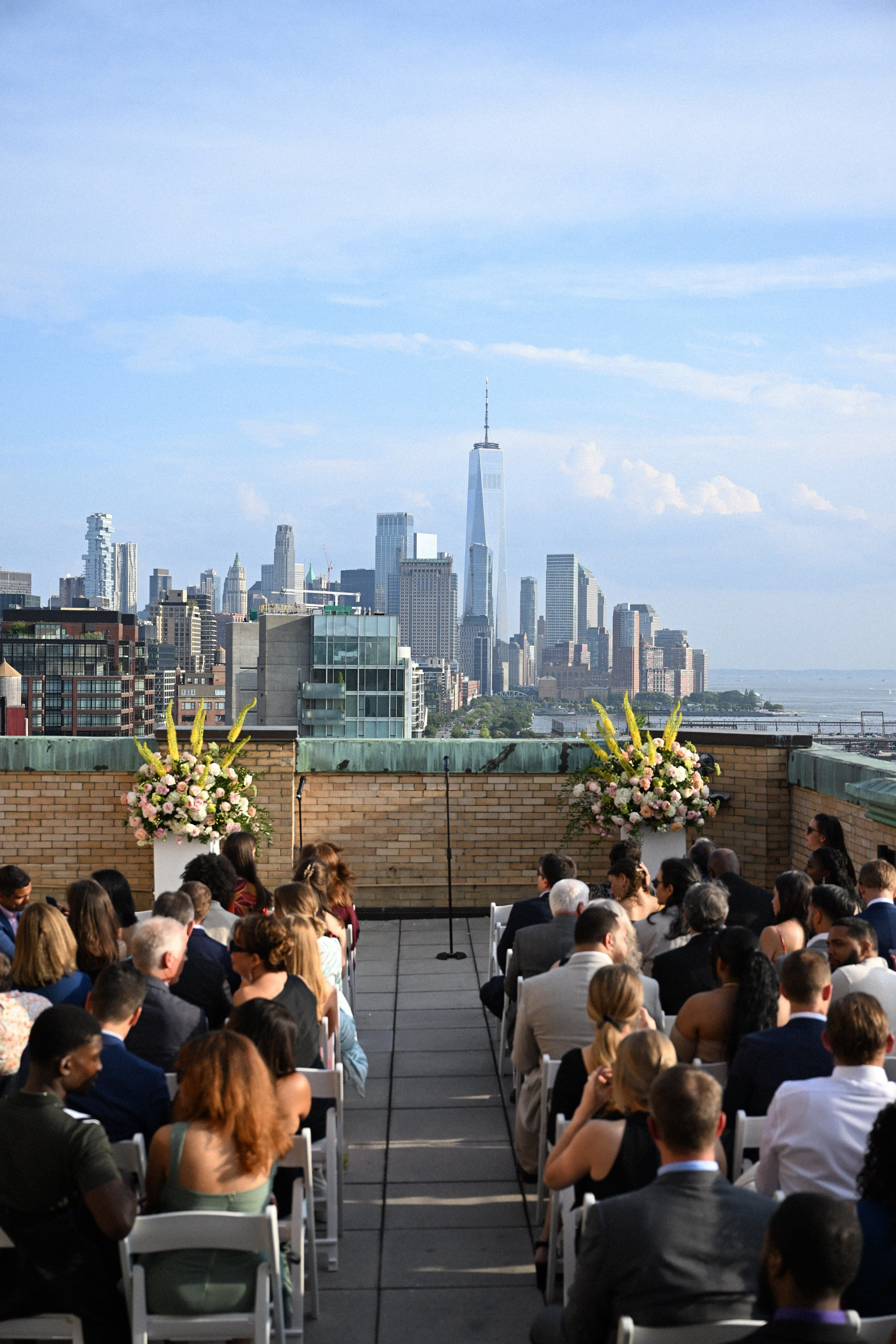 a crowd of people sitting on a roof