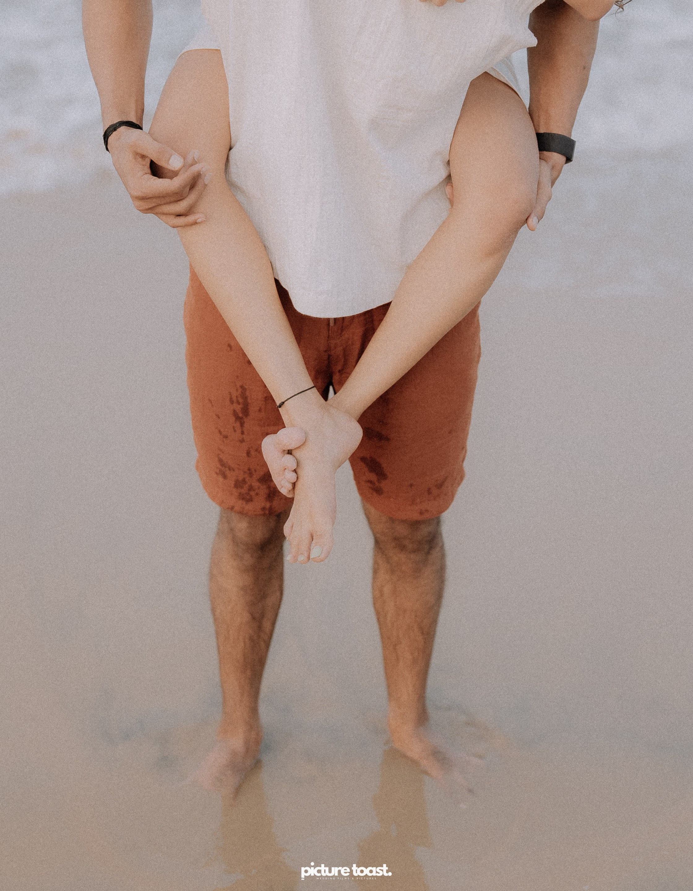 Love In The Beach. Fine art Wedding Photographers in India & Canada